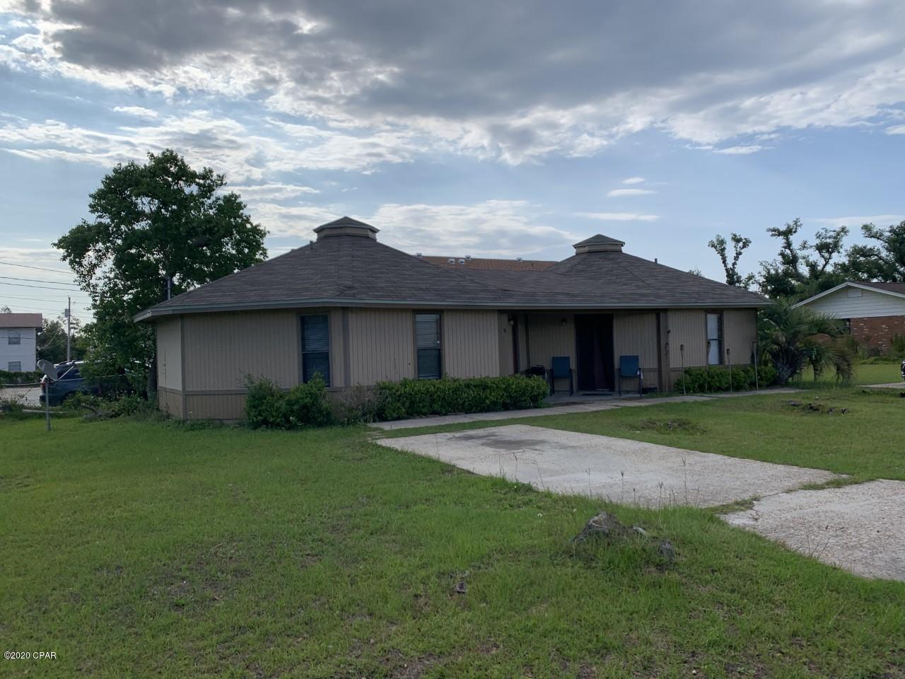 This quaint 2 bedroom 1 bath duplex unit is located in the Springfield area directly across from Rutherford High School and is ready for occupancy.  This unit features vaulted ceilings in the living/kitchen/dining room(s), and all tile floors.  There is also a large open yard and concrete parking for two vehicles. The listing agent and owner of this property is a licensed Florida real estate agent.