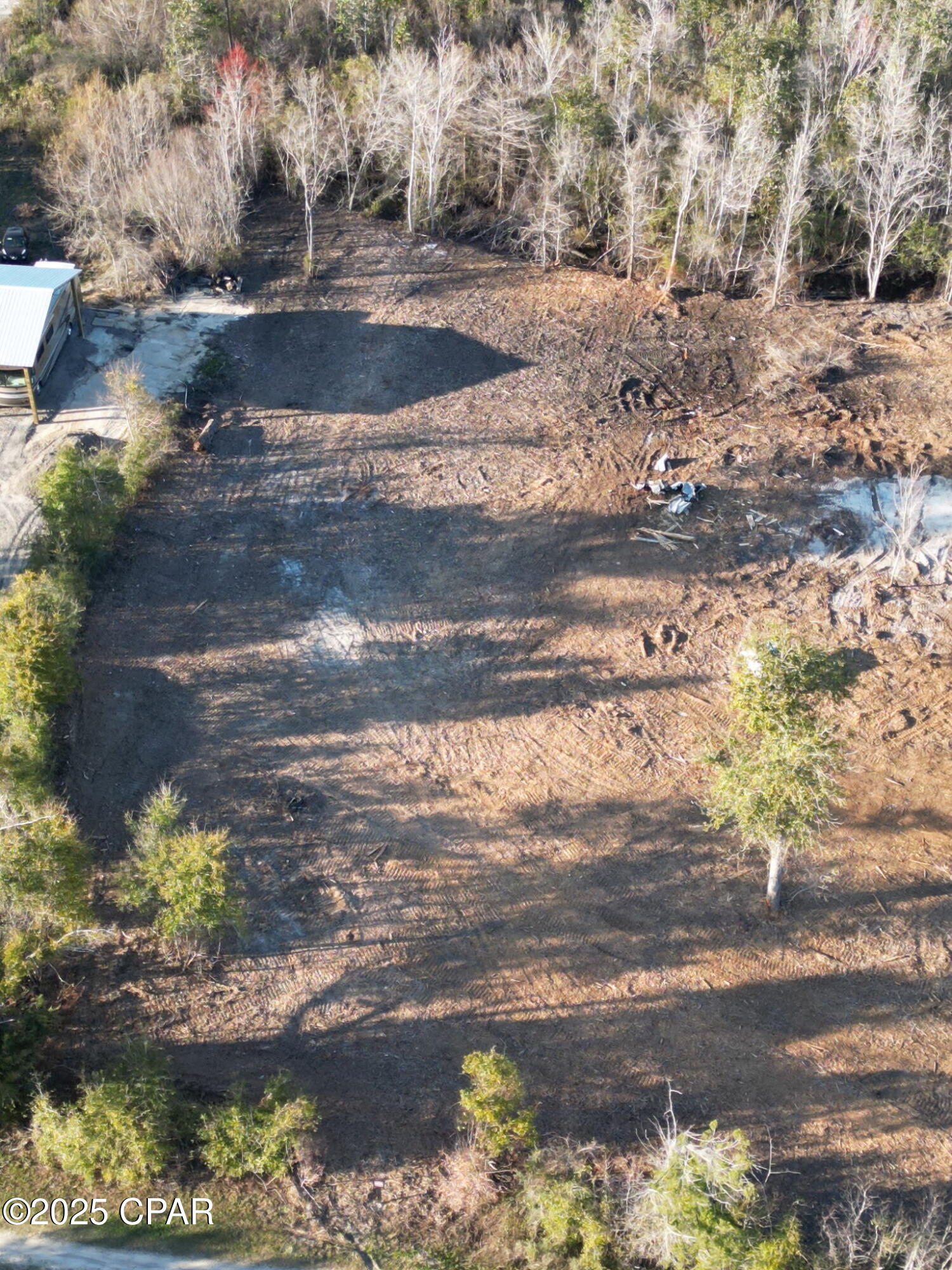 Waterfront property nestled along a serene canal with direct access to Bear Creek. The property is cleared and ready to build on or ready for a mobile home. Located in a highly desirable area just minutes from Panama City. This property combines tranquility and convenience, providing an exceptional opportunity to create your dream waterfront retreat, just a few yards off of a paved road. Don't miss out on this rare gem! 
All measurements are estimates and should be verified by buyer.