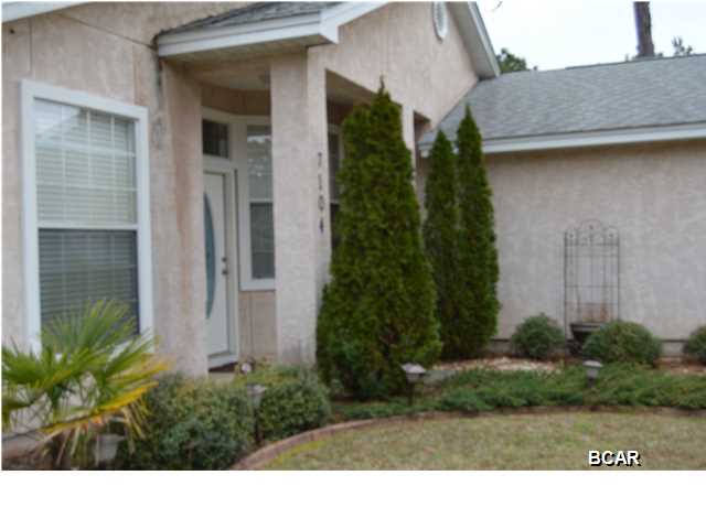 Well maintained, like new home located in the cul de sac on a one-street, side-walked neighborhood of nice homes. Home is open and airy with lots of natural light and neutral colors throughout. Home also offers a split bedroom floor plan and a spacious eat-in kitchen open to the large great room. There is also an 11' breakfast bar and under kitchen cabinet lighting, and an inside laundry room that easily accommodates a full sized washer and dryer. Both the formal dining room and master bedroom have vaulted ceilings. The raised ceilings and recessed lighting in the great room add to the spaciousness of this home. Both the master bedroom and the great room have their own private sliding doors to the open patio and large, privacy fenced backyard. Wooded area in the back of the privacy