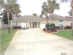 Beautiful executive home with an inground Salt chlorinated pool, all located in Palm Bay. This is one of a few homes located in Palm Bay that does not have to pay HOA's. Home is located on a Cul-de-sac and tucked towards the back of the newly paved Palm Bay subdivision. Large 3 bedroom 3 bath home with a great open floor plan, granite countertops in kitchen and baths. Very open wonderful for entertaining, with views of the pool and backyard throughout. Large Great room with wood floors, 10' ceilings and a Fireplace, the Master bedroom also has a fireplace, great for snuggling by on cold nights. All bedrooms are very nice sized with larger closets. Master bedroom has an en suite and one other bedroom has its own full bath, great for company. There is space that can be used for either