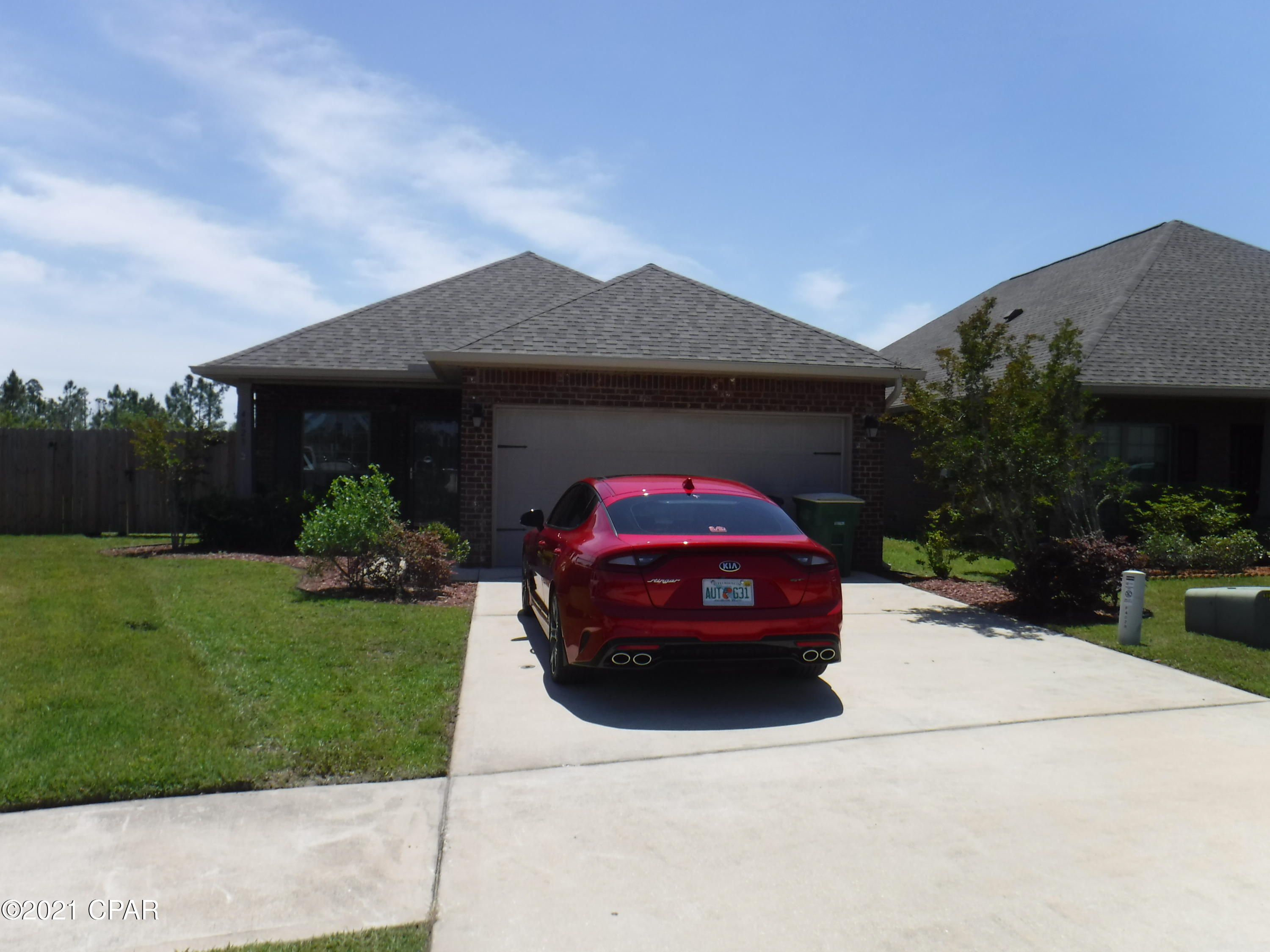 Centrally located beautiful craftsman style home in Plantation Park subdivision! Spacious all brick home, 3 bedrooms/2 bathrooms. The home features a covered front porch & back patio and fenced backyard!  The kitchen has granite countertops, breakfast bar, backsplash and stainless steel appliances. Master bedroom has a trey ceiling, crown molding, master bath features separate shower, garden tub, double vanity and walk in closet. There are hardwood floors in the living room, kitchen, dining area, and hall. Tile floors in the bathrooms and laundry room and wall to wall carpets in the bedrooms.  Living room has a trey ceiling with crown molding. Laundry Room includes Washer/Dryer (Non-Warranted) A dog or inside cat might be approved with owner approval and a non-refundable pet fee