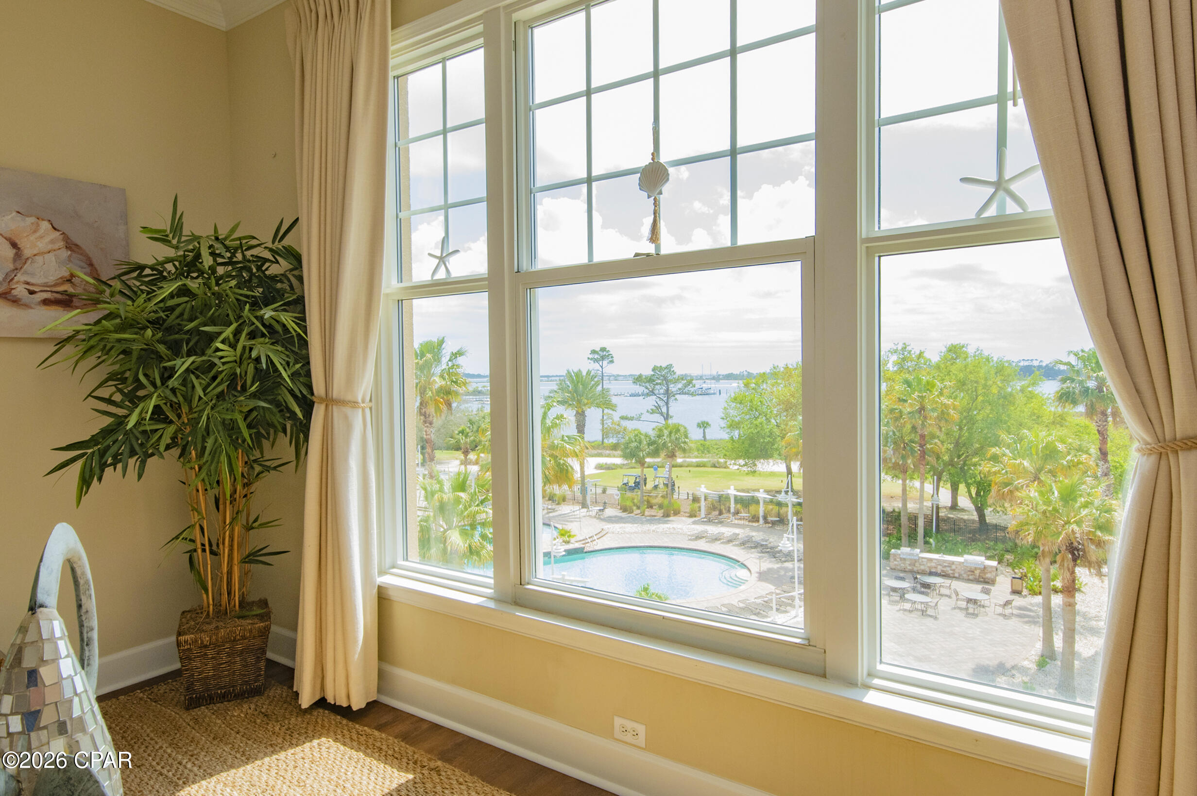 Welcome to resort-style living at Reflections at Bay Point. Currently the lowest-priced 2-bedroom unit available in the building, this beautifully updated 4th-floor condo offers stunning water views and an incredible opportunity to enjoy the Bay Point lifestyle.

Offered fully furnished and move-in ready, the interior features luxury vinyl plank and tile flooring throughout, updated living room furnishings and decor, stainless steel appliances, and a spacious primary suite with a beautifully updated walk-in shower and dual vanity.

Reflections is known for its resort-style amenities including a lagoon-style pool, heated pool, hot tub, fire pits, outdoor grilling area, owner's lounge, and beautifully maintained grounds, all within the gated Bay Point community.

Short-term rentals are allowed, making this property ideal as a primary residence, second home, or investment opportunity. Conveniently located near golf, marinas, restaurants, shopping, boating, and water activities, this condo offers the perfect blend of relaxation and convenience along the Emerald Coast.

Seller currently owns multiple units within Reflections at Bay Point and is expanding to a larger unit within the community, a testament to how much they enjoy the Bay Point lifestyle.