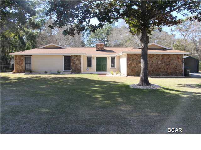 Beautiful upgraded home on 1 acre lot in Callaway. This 3 bedroom, 2 bath home has lots of recent updates to include: a remodeled kitchen with built in wine rack, stainless steel appliances, granite countertops, tiled backsplash, and pennant lighting; beautiful stained concrete flooring, a modern resurfaced fireplace, and a remodeled master bath. This open floor plan has a Florida room, HUGE landscaped yard, and a outdoor shed with electric and water. Only 10 minutes to TAFB! All sizes are approx., please measure if important.