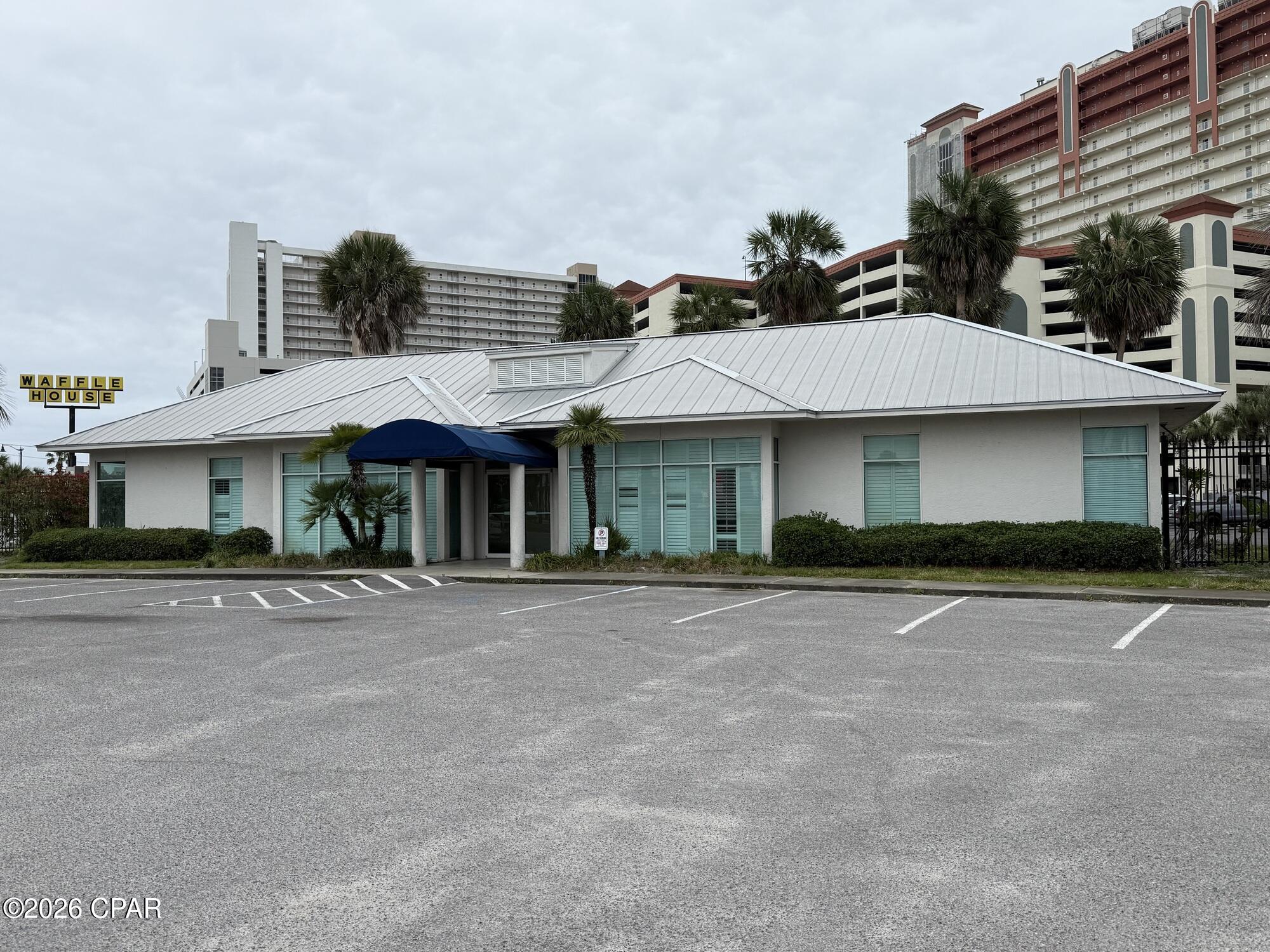 Position your business in the heart of Panama City Beach with this professional office building available for lease at 10511 Front Beach Road. Offering approximately 2,700 square feet, this move in ready office property is designed to support a wide range of professional, medical, administrative or service based businesses. NNN $6.40sqft 

The layout includes a welcoming lobby and front desk reception area, seven (7) private office spaces, a kitchenette, ADA accessible restrooms and ample on-site parking with an excellent parking ratio of approximately 10 spaces per 1,000 square feet. The property provides a functional and efficient floor plan ideal for businesses seeking visibility, accessibility and convenience in one of the most active commercial corridors in Panama City Beach.

Located directly on Front Beach Road, the property offers strong accessibility for both employees and clients while remaining close to major retail, hospitality, residential and tourism destinations throughout the beach market.

This is an excellent opportunity for businesses seeking a professional standalone office presence in a high demand coastal market.