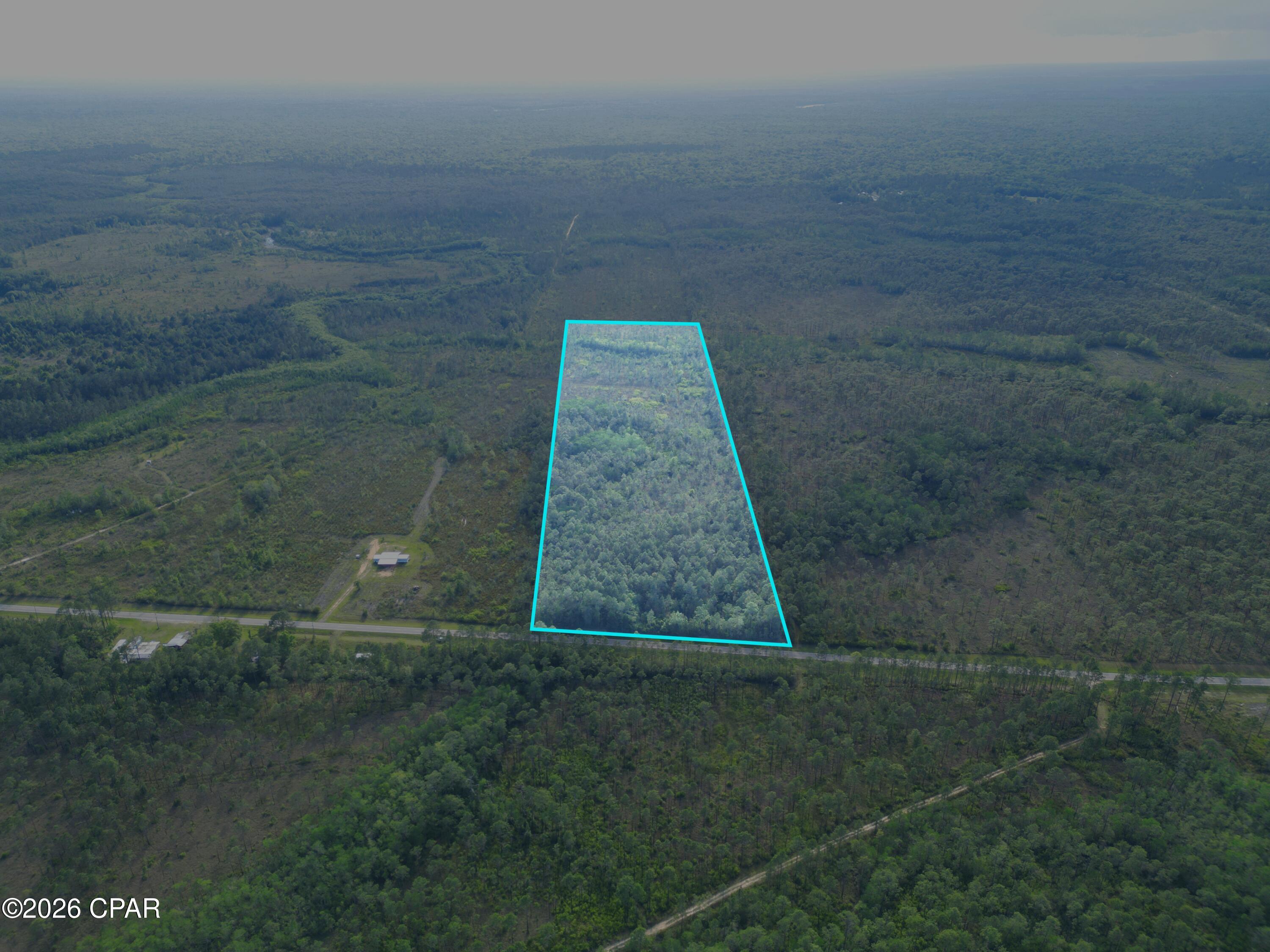 Discover your own slice of North Florida paradise with this rare 24+/- acre tract offering endless possibilities and true freedom with no HOA's and no restrictions. This pristine property adjoins expansive National Forest land, creating a unique opportunity for unmatched privacy, abundant wildlife, and direct access to thousands of acres of protected wilderness right from your backyard.

Whether you envision building your custom dream home tucked away among the trees, establishing a private family retreat, or designing a recreational getaway for hunting, hiking, riding, or camping, this blank canvas is ready to bring your vision to life. The natural surroundings provide a peaceful, secluded setting where you can truly disconnect.

Located just a short drive from Larkins Landing, you'll enjoy easy access to boating, fishing, and outdoor recreation, making this property ideal for nature enthusiasts and those who appreciate the Florida lifestyle. Even with its private and rural feel, the location offers excellent convenience, situated within an hour of both Tallahassee and the breathtaking coastal beauty of the Florida Big Bend region, including the Apalachicola National Forest and surrounding waterways.

Opportunities like this are increasingly rare. Large acreage tracts with direct adjacency to National Forest land do not come available often. This property is a true haven for those seeking space, freedom, and the ability to create a legacy worth leaving for generations to come.

Go take a look today to turn your vision, your plans, and your dreams into a reality.