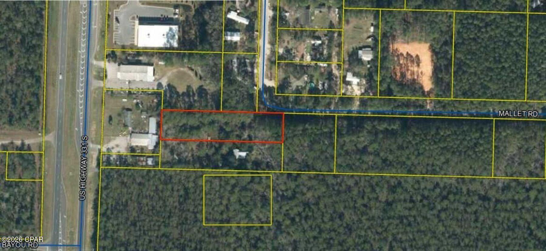 A rare opportunity to claim space, privacy, and possibility in one of the Panhandle's fastest-growing areas. Set among mature trees, this homesite offers a natural canvas with ample room to design and build exactly what you envision, whether that's a full-time residence or a weekend retreat that feels worlds away from the everyday. With no HOA restrictions, the property invites flexibility and freedom rarely found at this price point. The setting is quiet and unspoiled, yet remarkably convenient -- just a short drive to places along the white-sand shoreline and turquoise waters of the gulf, making beach days an easy part of your routine rather than a planned event. Located in Flood Zone X, the lot provides added peace of mind while preserving the character of its wooded surroundings.

Growth continues to shape the surrounding area, making this an appealing option for those looking to build now or secure land in a location poised for continued momentum.

Bring your plans, your vision, and your timeline; his is a place where it all has room to take shape.