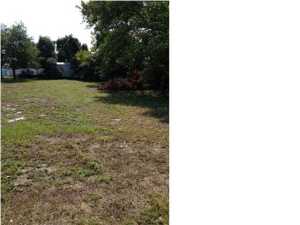 Laguna Beach lot. This home site is a short walk to the beach in this quiet beachy community with an old Florida feel. Water and electric are available and SEPTIC TANK IS ALREADY INSTALLED. It is ready for your little beach cottage. Pier park is only minutes away and the airport is just about 13 miles away. Don't miss this opportunity!