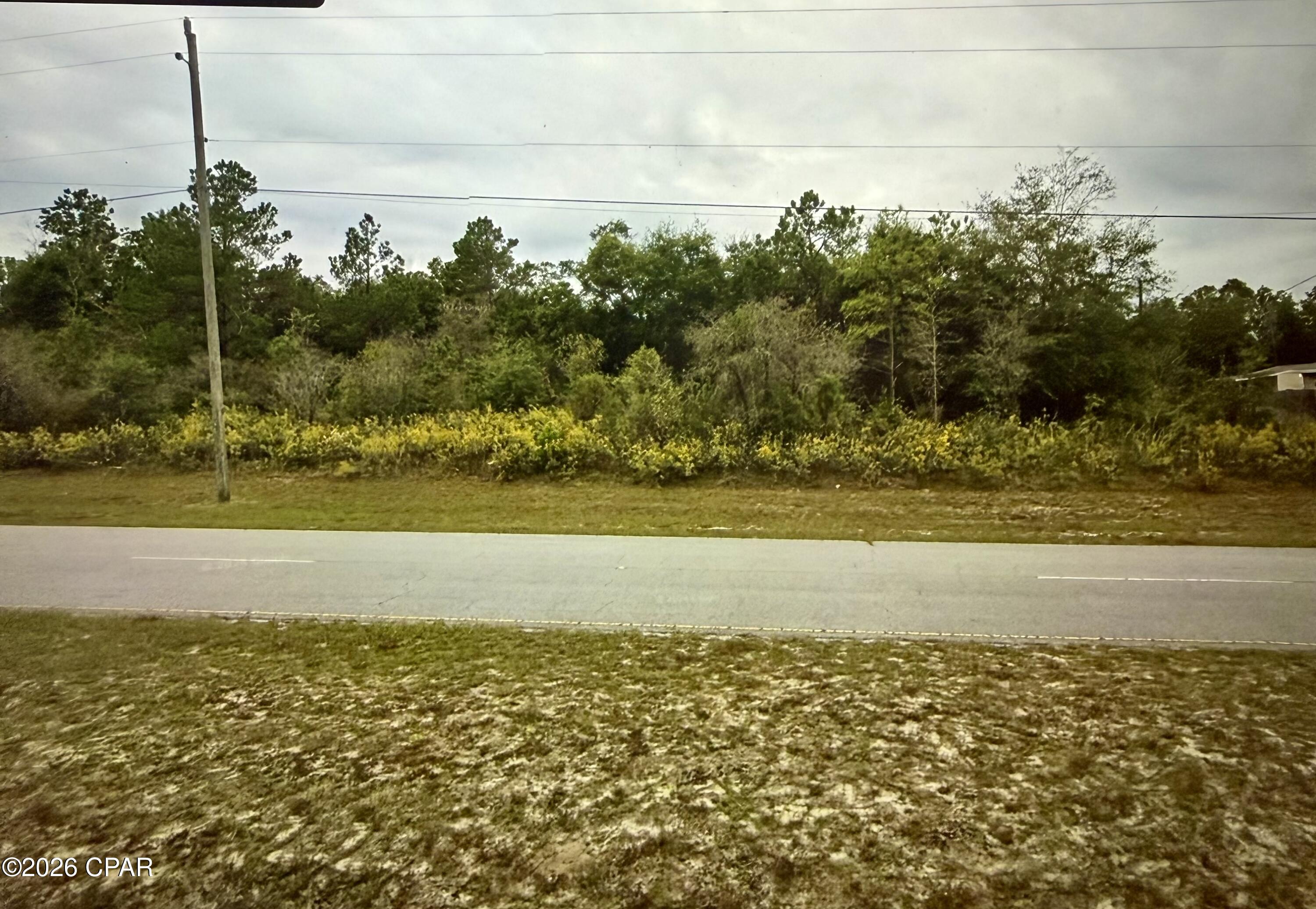 Oversized Lot in Sunny Hills - Mixed-Use Zoning & Paved Access

Located along Deltona Blvd in the Sunny Hills community, this 0.69-acre parcel offers a great combination of size, access, and flexibility. With paved road frontage, the property is easy to reach and well-positioned within a growing area of Washington County.

Sunny Hills is known for its mix of residential development and recreational features, including the nearby Sunny Hills Golf Course, making it appealing for both end users and long-term investors. The location also provides convenient access to Highway 77, placing Panama City and the Gulf Coast beaches within about a 40-minute drive.

The property is zoned Mixed Use, allowing for multiple potential uses, and its larger footprint compared to many nearby lots provides added space for planning and development.

A solid opportunity to build, hold, or invest in an expanding Northwest Florida market.