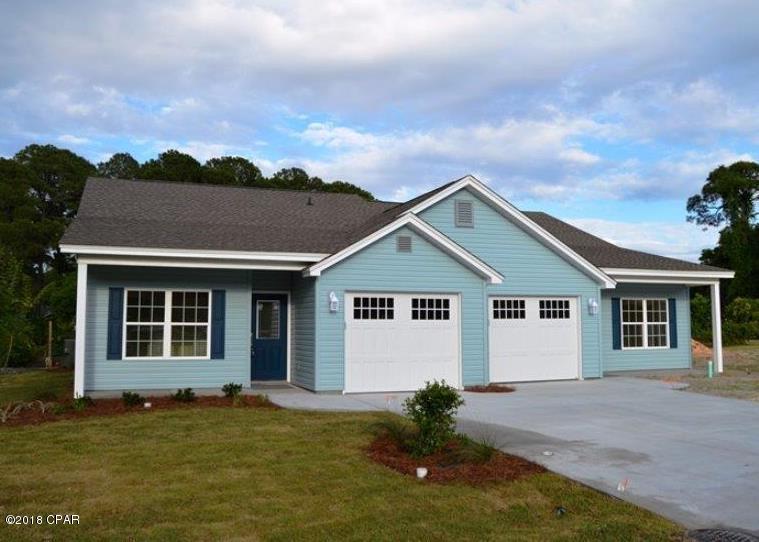 This waterfront duplex stands alone on the western side of Lake Caroline. Only 4-years old, it is practically new construction, built by one of Bay County's premier homebuilders.  Sound-proof features, 1,335 SF living area, 257 SF garage & large attic storage.  Split bedroom design with large master bedroom overlooking the lake, walk-in closet & spacious walk-in shower.  Ceramic tile floors in kitchen, baths & laundry. High elevation 16' above sea level, no storm damage.  Close proximity to St. Andrews, Lisenby Walking Park, Al Helms Dog Park & Panama City Garden Club.  Only 4 blocks from Beach Drive with public access to watch the sunset and a view of Shell Island and the State Park. Small pets will be considered with additional non-refundable pet deposit.  Call or email for appointment