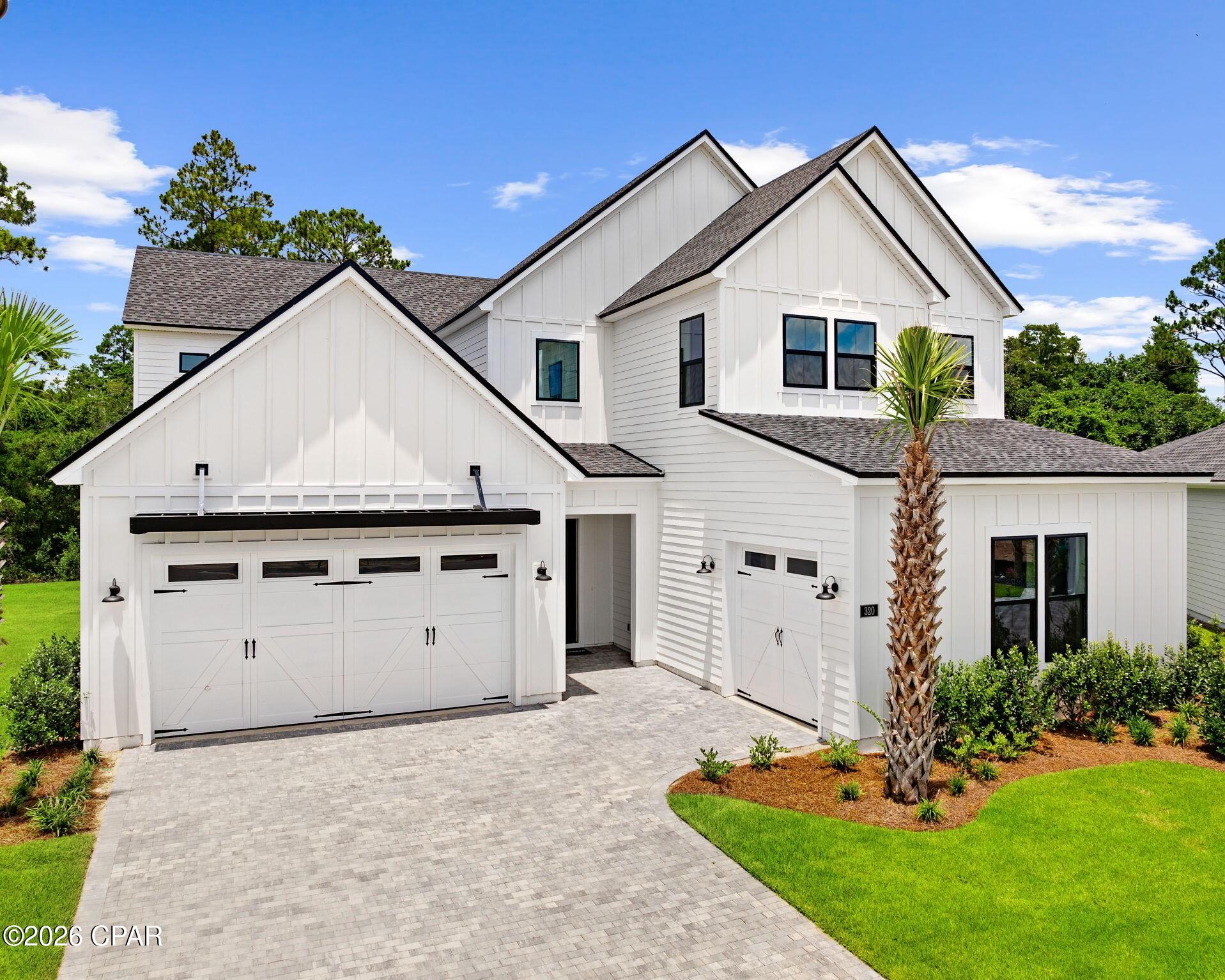 Welcome to this exceptional new construction Toll Brothers home, perfectly situated on a limited premium cul-de-sac homesite and available for quick move-in. Offering over 3,200 square feet of thoughtfully designed living space, this stunning residence features 5 spacious bedrooms, 3.5 bathrooms, and soaring ceilings that create an open, light-filled atmosphere throughout. Nestled in a gated community, this grand two-story residence boasts over 20-foot ceilings and an inviting open floor plan designed to impress from the moment you step inside. As you enter, you're greeted by the grandeur of soaring ceilings and an abundance of natural light that fills the home with warmth. The kitchen and great room a space that invites both creativity and connection, perfect for family gatherings or entertaining guests. On the main level is the primary suite, a true retreat offering both relaxation and luxury. With a spa-like bathroom featuring a large tile shower, a separate soaking tub, and two spacious walk-in closets, every detail has been meticulously designed to create an oasis of serenity. This is more than just a bedroom; it's a sanctuary where you can unwind in ultimate comfort. Upstairs, the expansive loft offer endless possibilities for your lifestyle, whether it's a game room, home theater, or a second living area. With four spacious bedrooms and 3.5 beautifully appointed baths, this home accommodates every need with elegance and functionality. The office room offers the ideal space for work, study or can be used as 5th bedroom. 3-car garage offers ample room for your vehicles, storage, and more. Step outside the multi slide glass door onto your screen-in covered lanai and embrace the natural wood preserve beauty providing both privacy and a tranquil setting. Situated on  one of the largest homesites in the neighborhood with over 11,300 sq ft giving lots of space between the homes in back and plenty of room for personalized backyard oasis.  The community is filled with completed resort style amenities, including pool, clubhouse, fitness center, pickleball courts, tennis court, playground, and a multi-purpose field. Short drive to public beach access, Pier Park shopping, dining and fun entertainment, airport, future FSU/TMH medical campus, future West Bay Center with Publix and recreation outdoor activities at Frank Brown Park. Don't miss the opportunity to make this extraordinary property your forever home, where every detail is crafted for your utmost enjoyment. Claim your everyday escape and live where others vacation. Lets start your new home journey today!