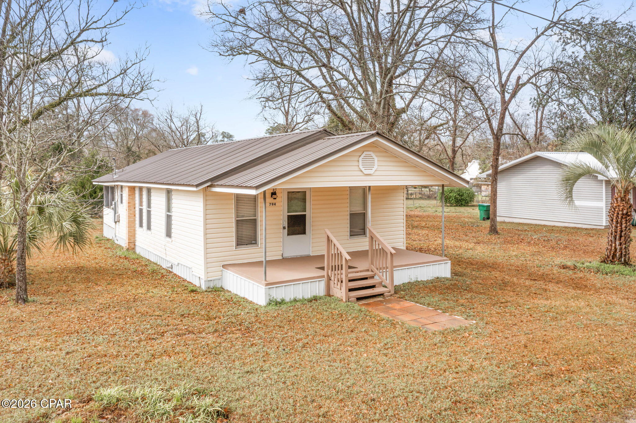 Charming and move-in ready! This 2 bedroom, 1 bath home is ideally situated on a corner lot in the City of Chipley and offers an excellent opportunity for homeowners or investors alike -- seller will consider owner financing. Step inside to find fresh paint and new vinyl plank flooring that give the home a clean, updated feel. Major improvements have already been taken care of, including a new AC system in 2023 and a roof replaced in 2016, providing added peace of mind. Outside, enjoy a screened-in back porch complete with laundry hookups -- perfect for relaxing while staying protected from the elements. The property also features a storage shed for tools, lawn equipment, or extra belongings. Conveniently located near schools, shopping, and local amenities, this property offers both comfort and accessibility. Don't miss your chance to own this affordable home with flexible financing options!