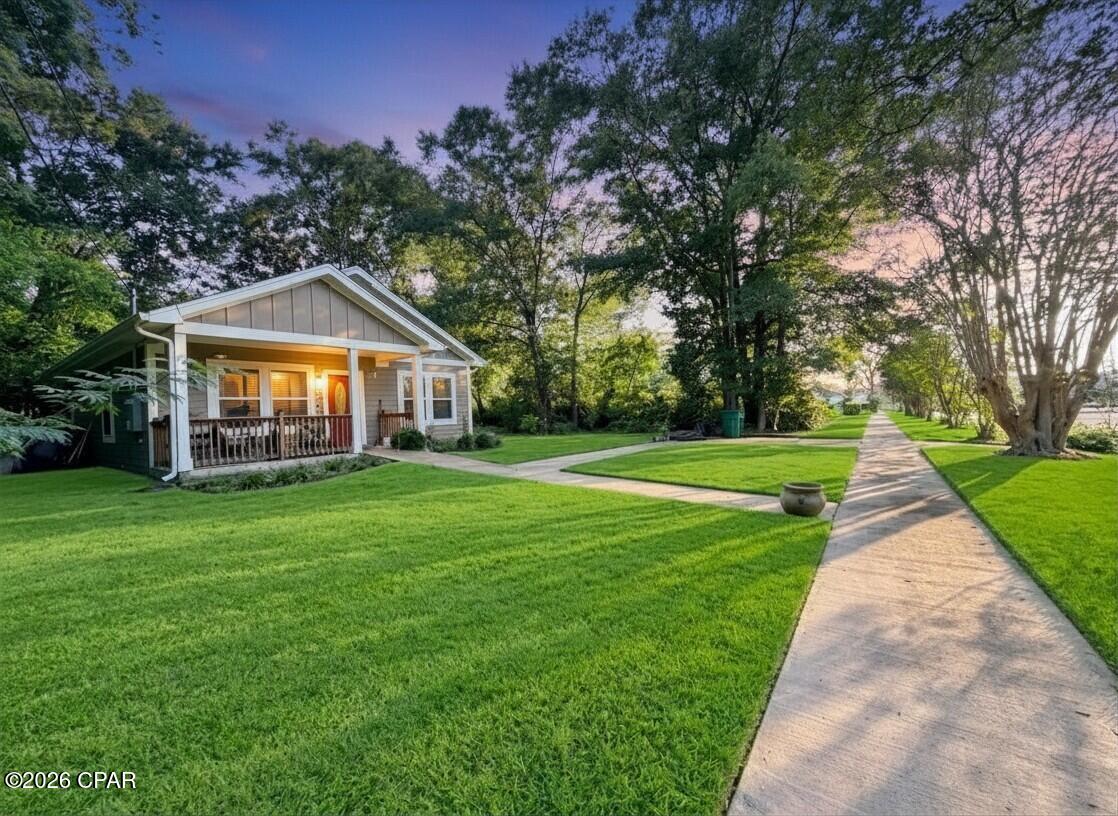 Welcome to the perfect blend of historic small-town charm and modern comfort. Nestled on a picturesque, tree-lined street just a short stroll from the heart of historic downtown Chipley Florida, this beautifully updated 2-bedroom, 2-bath home offers an inviting lifestyle where convenience, community, and comfort come together.

From the moment you step inside, you'll appreciate the bright, open feel created by soaring ceilings, abundant natural light, and a spacious layout designed for everyday living and effortless entertaining. The expansive living and dining areas flow seamlessly together, creating the ideal setting for hosting family and friends or simply relaxing at home.

The thoughtfully updated kitchen features generous cabinet space, modern finishes, and a functional design that makes meal preparation both easy and enjoyable. Throughout the home, tasteful updates provide a move-in-ready experience, allowing you to begin enjoying your new home from day one.

Step outside into your own private retreat. The backyard is surrounded by native Florida plants and mature landscaping, and is a blank canvas for creating a peaceful sanctuary perfect for enjoying your morning coffee, reading a book, gardening, or entertaining guests beneath the shade of established trees.

One of this home's greatest features is its exceptional location. Enjoy the convenience of walking to historic downtown Chipley, where you'll find locally owned boutiques, antique shops, restaurants, coffee shops, parks, and community gathering spaces. Spend your weekends exploring seasonal festivals, farmers markets, holiday celebrations, live music, food truck events, and other community activities that make downtown Chipley such a special place to call home. 
Schedule your showing today to see everything this charming property has to offer!
*Some photos contain virtual staging