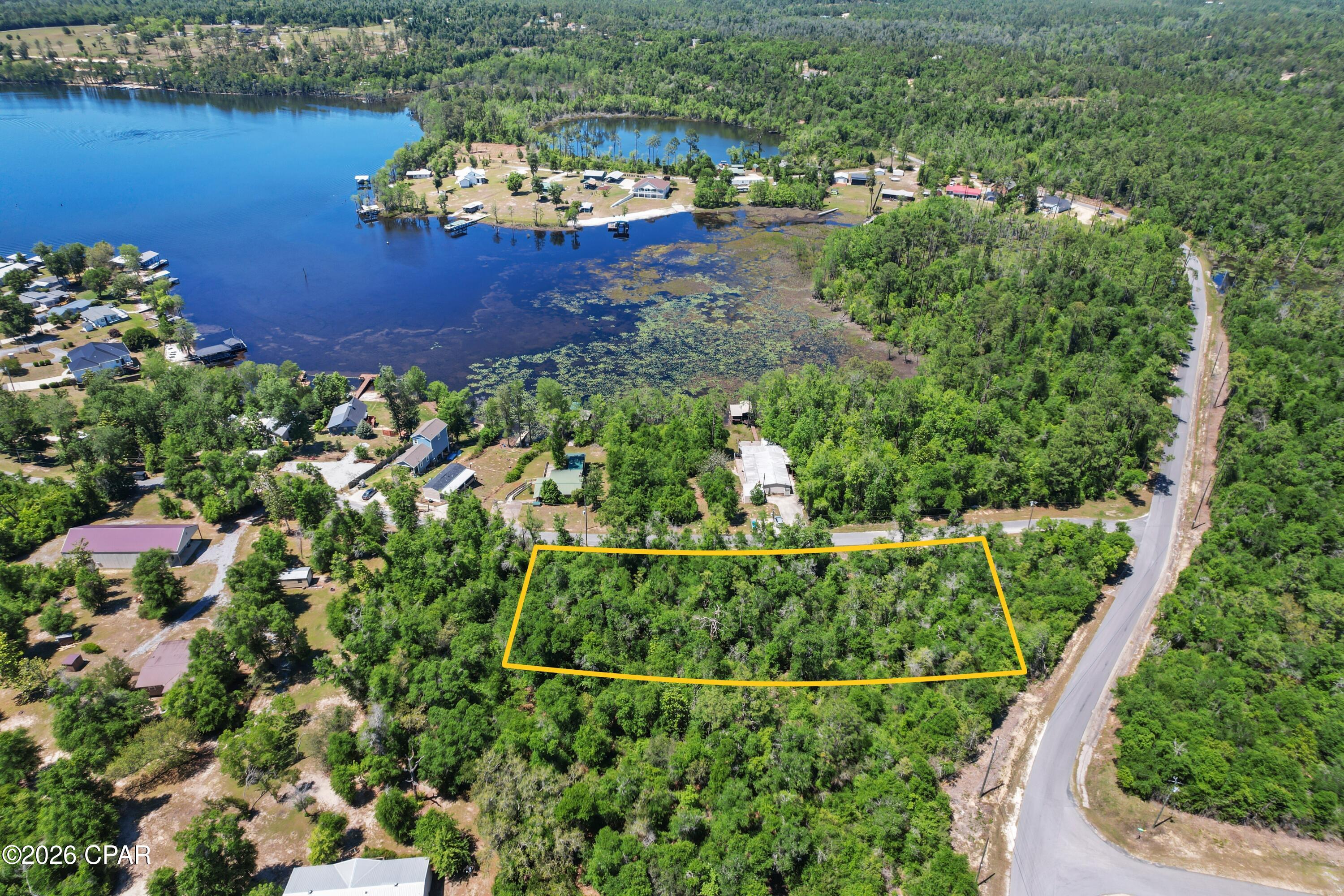 *** PRICE REDUCED! *** Build your dream home on this beautiful 1.26 acre lot with wonderful views of Compass Lake.  You'll enjoy NO HOA but still have access to a public boat ramp.  You'll have plenty of room for a pole barn, a large storage building, or a future swimming pool and a backyard oasis. The possibilities are endless!  Compass Lake is a highly desirable community, and the spring fed crystal clear lake is perfect for boating, jet skiing, wakeboarding, and fishing! If you love the outdoors and being in nature, then this is the perfect homesite for you.  Go and see this beautiful lot today! All measurements are approximate, please verify if important.
