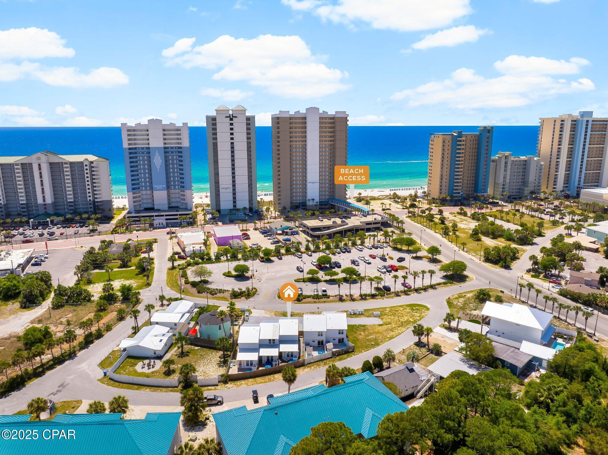 * 5 Doors from the Shore - Invest in Style & Income!* 
Investor's dream in Panama City Beach! This exceptional turnkey rental package includes a beautifully designed triplex and duplex, sold together and fully furnished for immediate income generation. Built in 2020, the triplex offers over 4,000 square feet of thoughtfully planned space, featuring 9 bedrooms and 9 bathrooms across three individually themed units: The Beach Cabana, The Groovy Shack, and Welcome to Paradise. Each unit is uniquely styled to provide guests with a one-of-a-kind, Instagram-worthy experience, complete with private entrances, vibrant exterior doors, and modern coastal finishes that capture the laid-back beach vibe.
The adjoining duplex adds another 2,800 square feet of living space, offering 4 bedrooms and 6 bathrooms across two distinct units: The Surf House and The Tropical House. Like the triplex, these units continue the playful, curated design aesthetic and are optimized for maximum guest appeal and rental performance. Every unit has been thoughtfully furnished and is fully equipped, making this a true plug-and-play investment opportunity.
Guests will love the short walk to the Gulf, where they can enjoy white sandy beaches and turquoise waters—making these rentals even more attractive in Panama City Beach's thriving vacation market. With strong rental history and impressive income (figures available upon request), this property is already a high-performing asset with even more room to grow.
Plans are in place for a 3-bedroom townhouse to be added on the west side of the lot, offering future expansion potential and additional income opportunities. Located just minutes from popular dining, shopping, and entertainment, this property package delivers the perfect combination of location, lifestyle, and long-term value. Whether you're looking to expand your portfolio or break into the short-term rental space, this opportunity checks all the boxes.