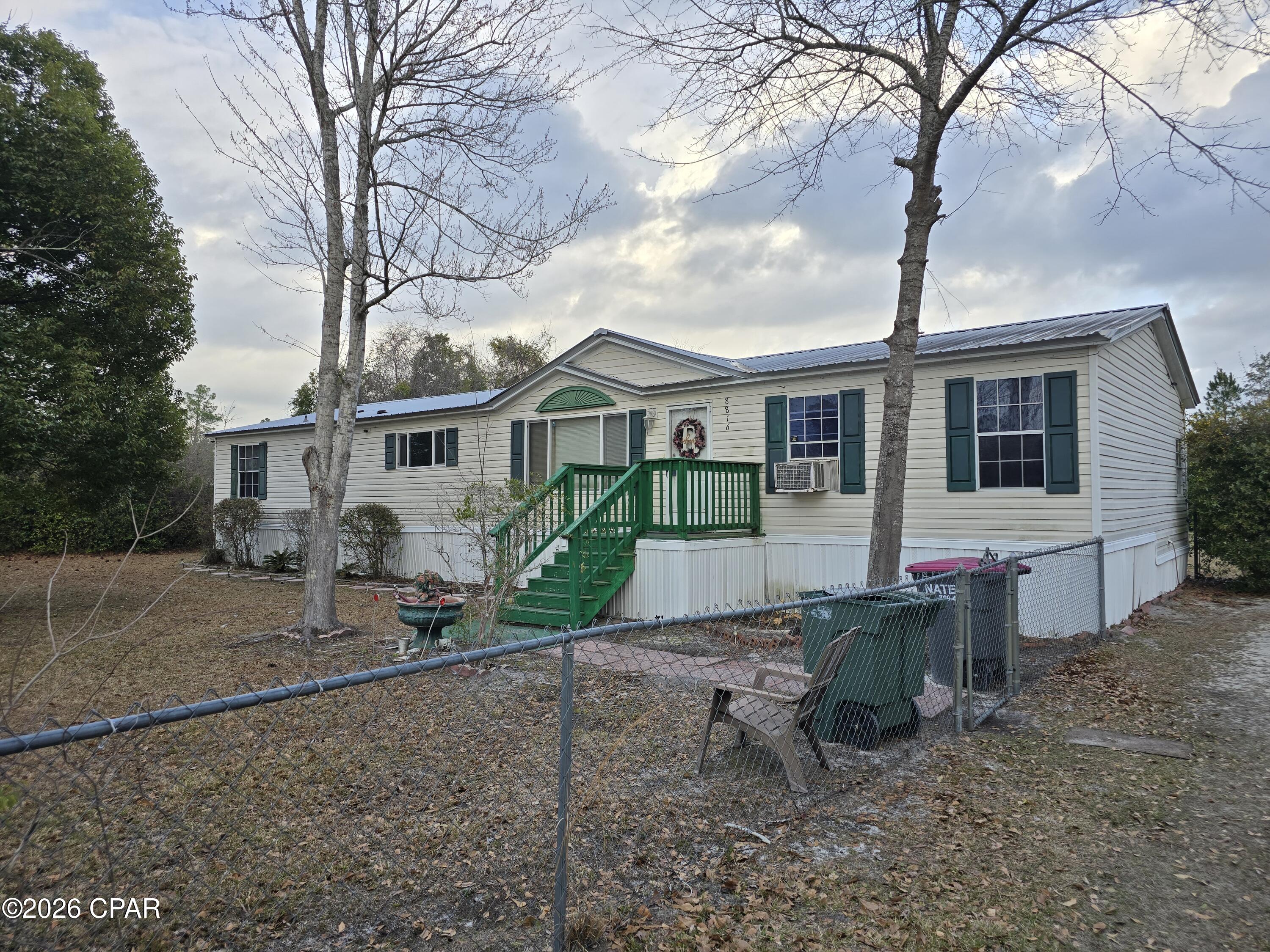 SELLER SAYS BRING ALL OFFERS///If you are tired of the hustle and bustle of town living and just looking for a more rural area with more room to grow and privacy. Then you have found it!! This property has it all. Siting on a beautiful acre of land that is fenced in gives you plenty of room for boats, campers, ATV's, even your very own garden/////// You can clearly see the '' pride in ownership '' the seller had in the years living here by the condition of the property. This home itself is over 1800 sq. ft. With a little TLC you can personalize this home to be your very own and meets your families needs. There are a total of 3 outbuildings on the property for PLENTY OF STORAGE!!! Call to see it today, it will not last long at this price///