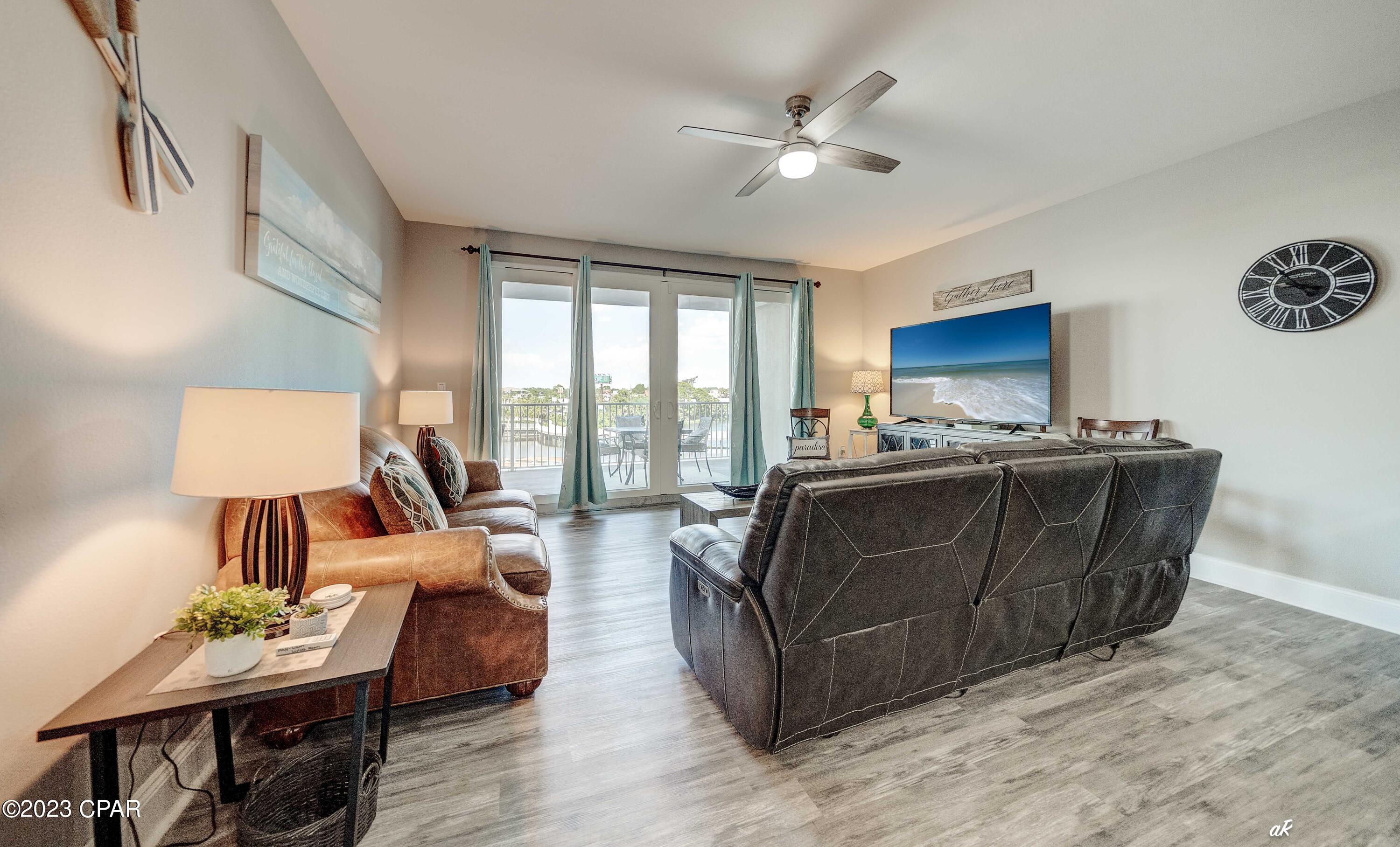 HUGE PRICE IMPROVEMENT! LOWEST PRICED 3 Bdrm 3 Bath!! Great Investment Opportunity in Highly Sought After Laketown Wharf. Unit on 2nd floor so easy to take stairs when busy elevators. Beautiful Lagoon View & partial Gulf Views. ALL NEW EVERYTHING: New Furniture & Mattresses. New Appliances & Kitchenware. New Decor, Bedding & Towel Sets in every Bedroom & Bath.  1681 SQ FT so its LARGEST unit. Laketown Wharf has 5 Pools, 3 Hot Tubs, Exercise Room, Putting Green & Nightly Water/Light Show on the Lagoon which you can watch from your balcony. New paint & Flooring. 3 Bedroom. 3 Bath. Bunk room w/ Single Bed. Sleeps 8 Easily.