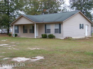 Nice 3/2 vinyl home located close to town in Ridgeway Estates. Split floor plan, lots of kitchen cabinets, spacious rooms, cathedral ceiling in living and dining room w/ open floor plan, lots of closet space in bedrooms. Front porch has plenty of room for rockers and back yard has patio and storage/shop bldg with carport attached and chain link fencing for children and pets.
