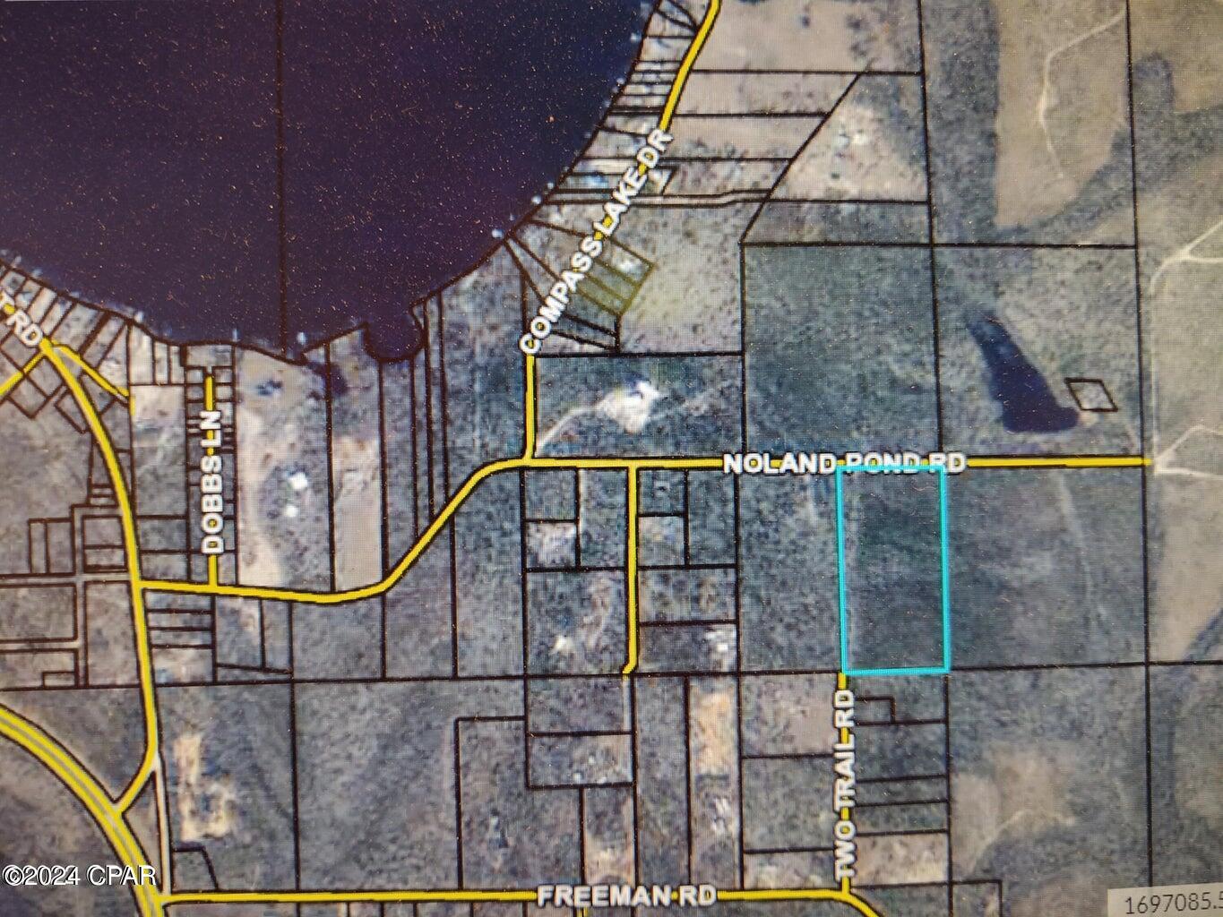 LOT #1, 3, 4, 5, 6, 7, 8 OR 9 -Nicely wooded, level pine timberland with some areas including beautiful spring fed streams.  Property is located immediately East of the Main Compass Lake in rural Jackson County, FL.  This property is currently zoned Agricultural, and therefore has the least amount of restrictions on building types and farm animals that you may have on your property.  Owner financing is available if needed,  Terms are 20% down, 6 % interest, 15 year- Amortization.  Buyer is responsible for the cost of a survey of the lot at the time of closing.  A 30' Legal Easement along the western boundary line will be conveyed from Noland Pond Road to all 10 lots broken out of parent parcel.