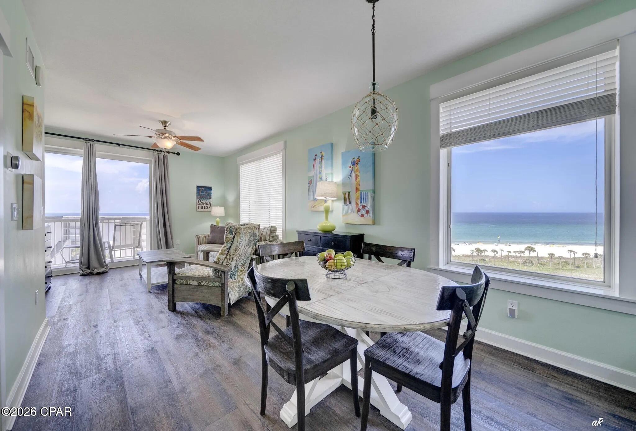 Bright and spacious 3 bed 3 bath corner condo plus bunk beds with sweeping ocean and beach views. This stunning residence features an open-concept layout filled with natural light. The modern kitchen boasts high-end appliances, sleek countertops, and generous storage--perfect for entertaining or relaxed coastal living. Each bedroom offers privacy and comfort, with the primary suite showcasing a private balcony access.  

Enjoy resort-style amenities, secure parking, and a prime location just steps from the sand, local dining, and boutique shops. This is beachfront living at its finest--a rare opportunity to own a stylish, turn-key home with unbeatable views.