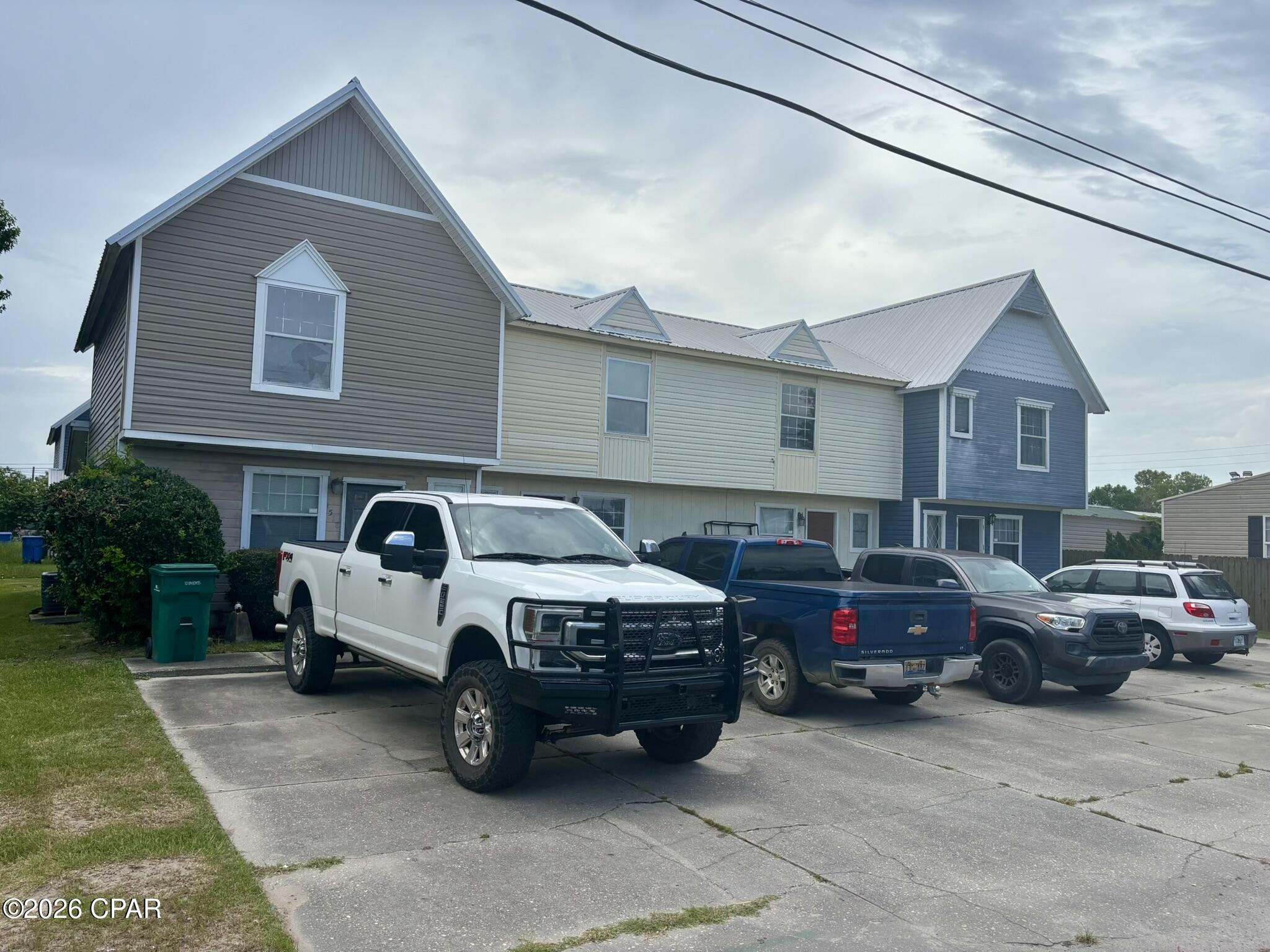 Turn key quadplex in a great central location convenient to Highway 98. Property boasts a new metal roof after Hurricane Michael and an excellent rental history. Owner responsibilities are limited with each unit being separately metered for water and electric with residents paying their own utilities. Live in one and rent out the rest to or rent all 4 for a cash flow machine!
