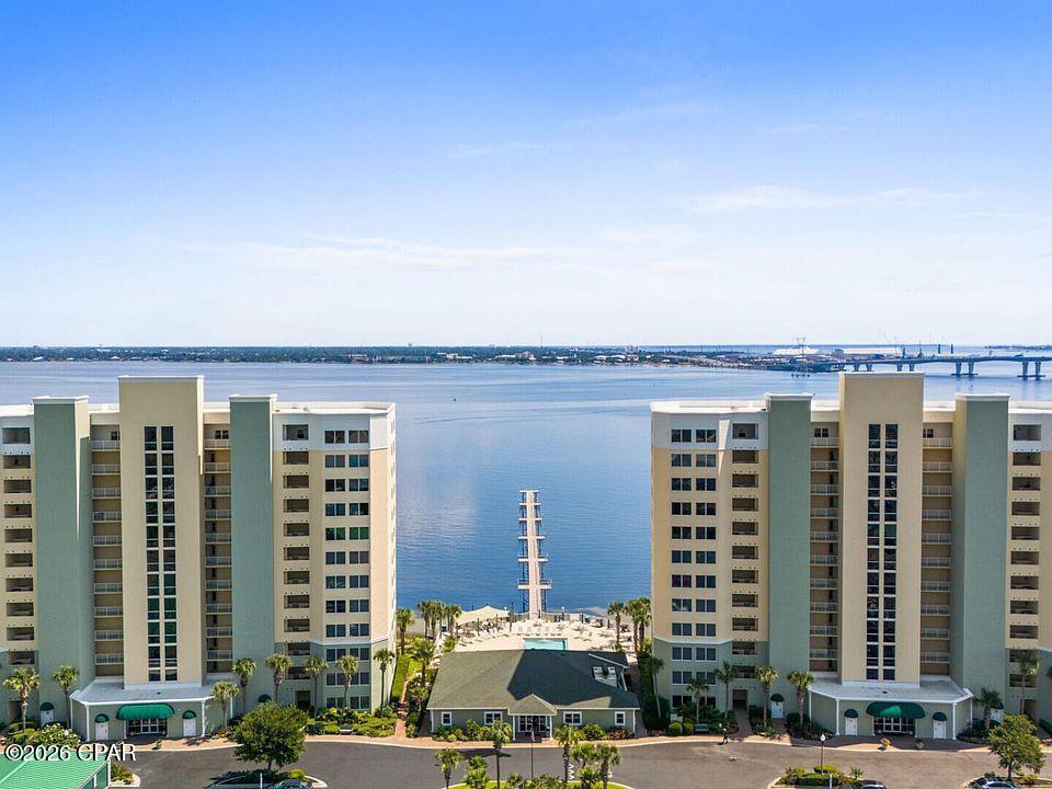 Enjoy a gated community with resort-style amenities including marina access, pool, fitness center, tennis courts, and more. Beautiful 3-bedroom, 2.5-bath condo overlooking the Bay with breathtaking water views. Open floor plan with tile flooring throughout and spacious living areas designed for comfortable coastal living. Seller will entertain owner financing for qualified buyers, a rare and exciting opportunity in today's market. Call today for your private showing. Professional photography coming Monday!