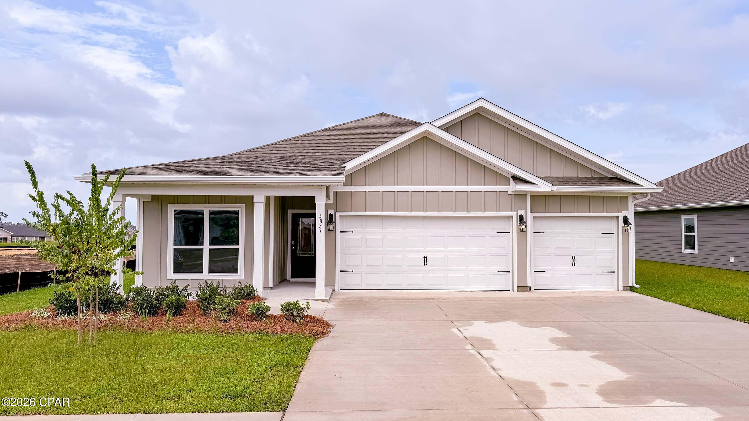 HOME OF THE WEEK ~ Welcome to the Madison, a new home floor plan at Titus Park in Panama City, Florida. The Madison is one of our many featured one-story homes at the beautiful Titus Park community.

When you walk into the home, you are greeted by a long hallway that is the center point for bedrooms, the laundry room and garage, and leads to the open living room and kitchen. Beautiful engineered vinyl plank (EVP) flooring lines the main areas of the house and soft carpet covers the bedrooms.

The bedroom closest to the garage also comes with its own bathroom, not shared in the main hallway. The bathrooms have beautiful white quartz countertops and white cabinets that enhance the beauty of this home.

Entering the kitchen and living room area, you will notice plenty of natural sunlight illuminating the main area. The living room has tray ceilings that open the room, making your living space feel much more comfortable. The kitchen has stainless steel appliances and comes with beautiful white cabinets. The large island has plenty of storage in it and every surface has elegant white quartz countertops. The dining area is located by the back door leading to the covered rear patio.

Walking into the large primary bedroom, you will also see tray ceilings and three windows that wash the room in natural sunlight. The primary bathroom has a spacious double vanity with white quartz countertops and white cabinetry. The walk-in closet is in the bathroom as well, perfect for when you get out of the separate tub or shower with glass doors.

Appreciate the convenience of a Smart Home technology package, featuring keyless entry and an intuitive control panel for your thermostat, lighting, and security systems. The exterior of this home features Hardie Color Plus Siding and is uniquely engineered to stand up to the harshest elements from wind, rain, fire, freezing temperatures, and hail. Dimensional shingles with 30-year warranty. A landscaped front flower bed at entry way and fully sodded yard. Our Titus Park community features underground utilities making it less susceptible to damage from severe weather leading to fewer outages and more reliable service. Residents of Titus Park can enjoy exclusive access to the newly built amenity center with a pool, BBQ pits and lounge chairs!

The Madison is a favorite choice among buyers in Titus Park. Stop by the model home today to see for yourself and find your next home at Titus Park in Panama City!
