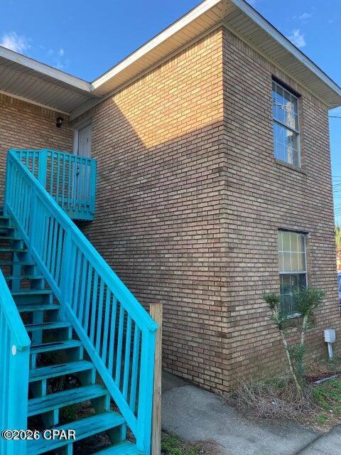 Location is king with this unit! Located 2 blocks from Beach Access 45 leading to the white sands of the Gulf of Mexico. This 1 bedroom 1 bath second level unit features open kitchen and living room. In unit laundry hook up and balcony/patio off of the living room. This unit has new paint, new painted floors, new cabinets, and new appliances.