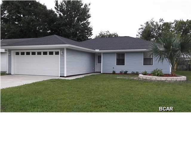 Completely remodeled home with fireplace, breakfast bar, open floor plan, wood and ceramic tile floors, 2-car garage, and privacy fenced back yard. close to TAFB.