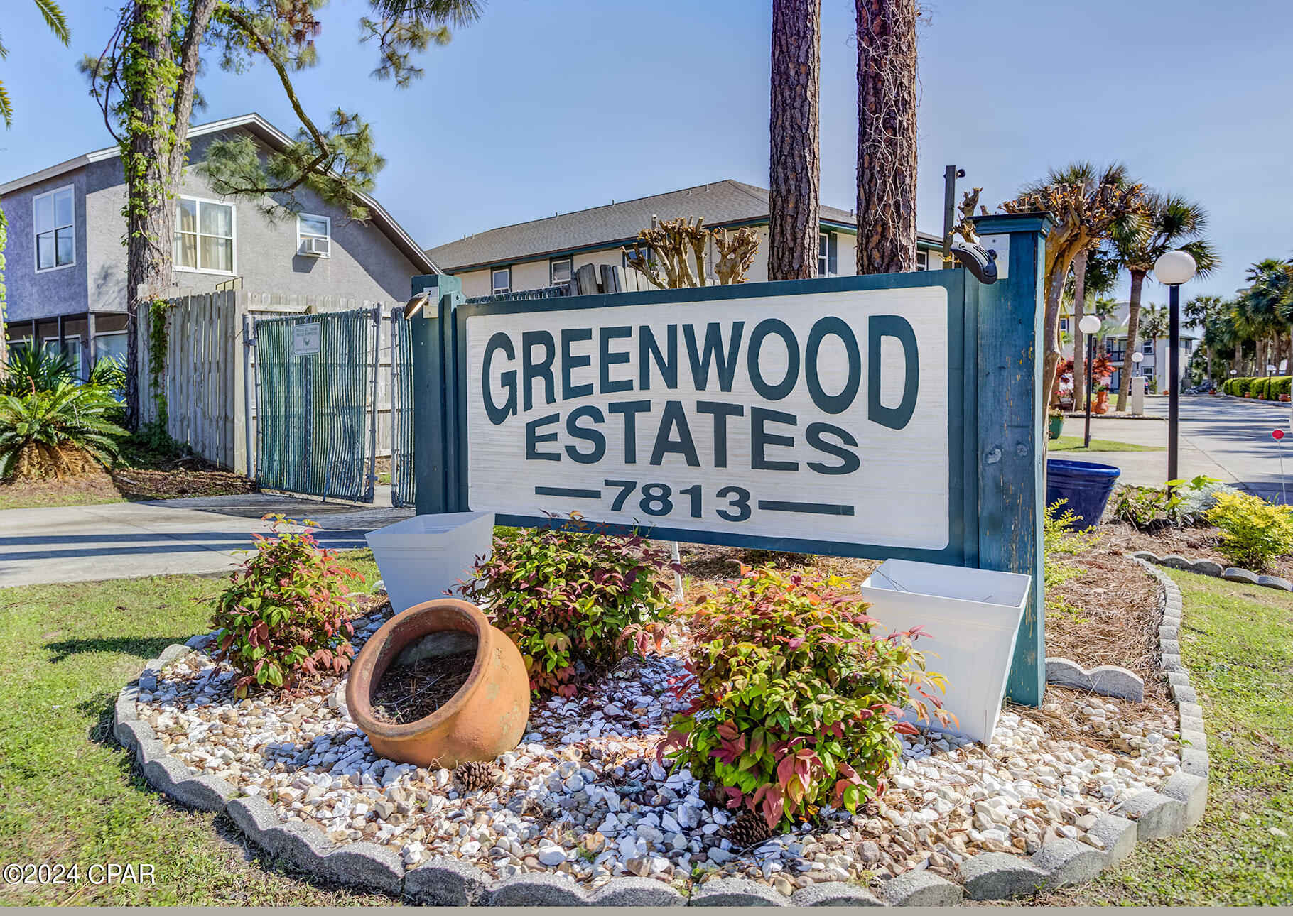 Life is grand on Grand Lagoon! This freshly updated 3MB/3MB Condominium in beautiful Greenwood Estates sports numerous updates including: new HVAC (2022); Water Heater (2024); Interior Paint (2025) and beautiful new Quartz Kitchen Countertops.  Each bedroom has its own full bathroom with a two bedroom down and one up, unique and practical floorplan.  Additionally, enjoy the extra space of the loft suitable for a home office or den with spectacular views of The Grand Lagoon.  Wave to the dolphins as you watch them play.  Tastefully furnished and decorated, this is not a rental property and has served as a full-time residence for the current owner.  Greenwood Estates extensive amenities include an awesome, clean swimming pool with grilling and picnic areas! Enjoy fishing from the boat dock. 
 Seller has a transferable (sign at closing) agreement with the HOA to occupy and use Boat Slip #11.  Boat Slip #11 was rebuilt in 2022 and the lift comes with an extra motor.  Furnishings as shown, are included is this incredible Grand Lagoon dream home.  Saltwater access makes for memorable days at nearby Shell Island and fishing trips in the Gulf of America.  Just another day in paradise! Thank yourselves nightly for this quality of life that few aspire to! Contact your favorite Realtor and come take a look today!