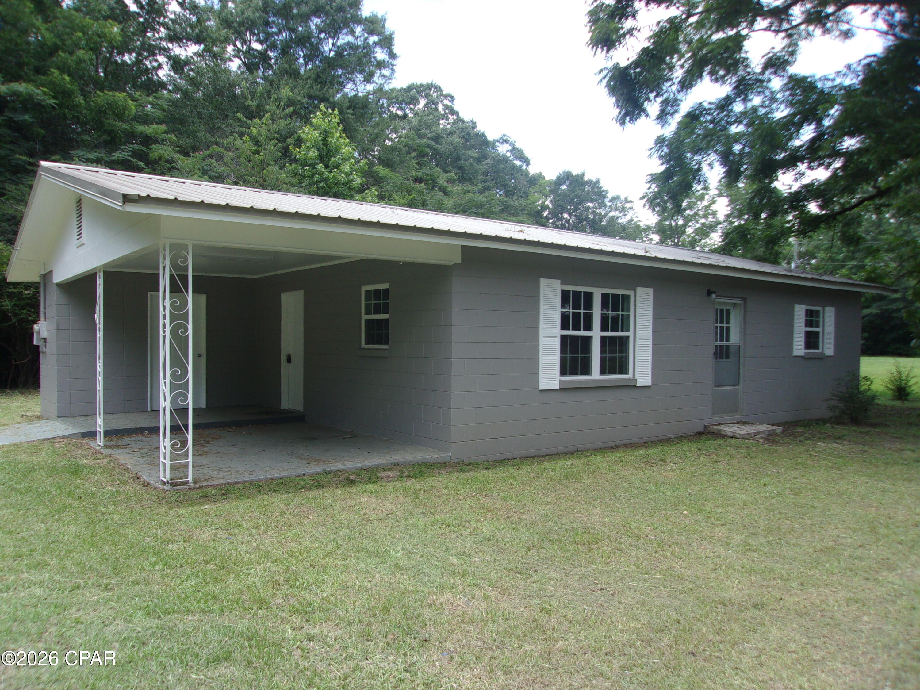 Charming like new Move-In Ready Home in Graceville, Florida. Welcome home to this beautifully updated block home situated on a spacious 0.35-acre lot along a quiet city street in the heart of Graceville. New windows, doors, appliances, air conditioning, floors, cabinets, countertops, sinks, fixtures, bathroom, and paint inside and out. This property offers the perfect blend of small-town living and modern updates, making it an excellent choice for first-time homebuyers, retirees, or investors.
Inside, you'll find numerous recent improvements, including new windows, new cabinetry, new countertops, new flooring throughout, a new shower/tub combination, a new refrigerator, and a fresh coat of paint that gives the home a bright, clean feel. The home is equipped with central heating and air conditioning for year-round comfort.
Enjoy the convenience of city water and sewer service, along with the peace and quiet of an established neighborhood. The generous lot provides plenty of room for outdoor activities and gardening. As an added bonus, you're located just over an hour from Panama City Beach, home to some of the world's most beautiful white-sand beaches and emerald-green waters. If you're looking for an affordable, updated home that's move-in ready and conveniently located, this Graceville gem deserves a closer look.