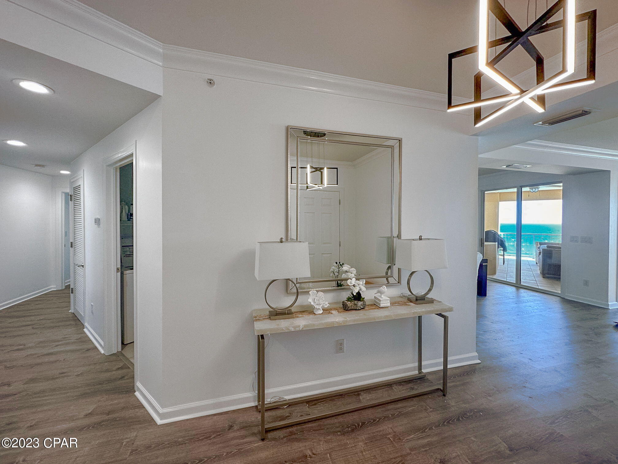 En Soleil is the most luxurious Gulf Front Condominium that Panama City Beach has to offer. This west end unit has been professionally decorated and completely updated. In addition to the 2300+ sq ft condo you will also enjoy your own private outdoor living area with a built-in gas grill to enjoy the breath-taking views of the Gulf of Mexico. The master bedroom overlooks the gulf and includes a separate shower, garden tub, and walk-in closet. Stainless steel kitchen appliances, 9' ceilings, crown molding, and recessed lighting. With only 3 units per floor, En Soleil offers privacy to all owners. With resort-style amenities including a magnificent sun deck, owner's lounge, 6,500 square feet of gulf front pools, gulf front fitness center, underground parking, additional outdoor parking, and 24 hr. security. Parking spot # 5.  Perfect for your new beach home or rental! . Call your realtor today to see this GREAT property.