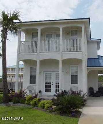 Beach home with balconies that have a gulf view. Carport with storage, enclosed patio, and just one block to the beach. 



All measurements are approximate.