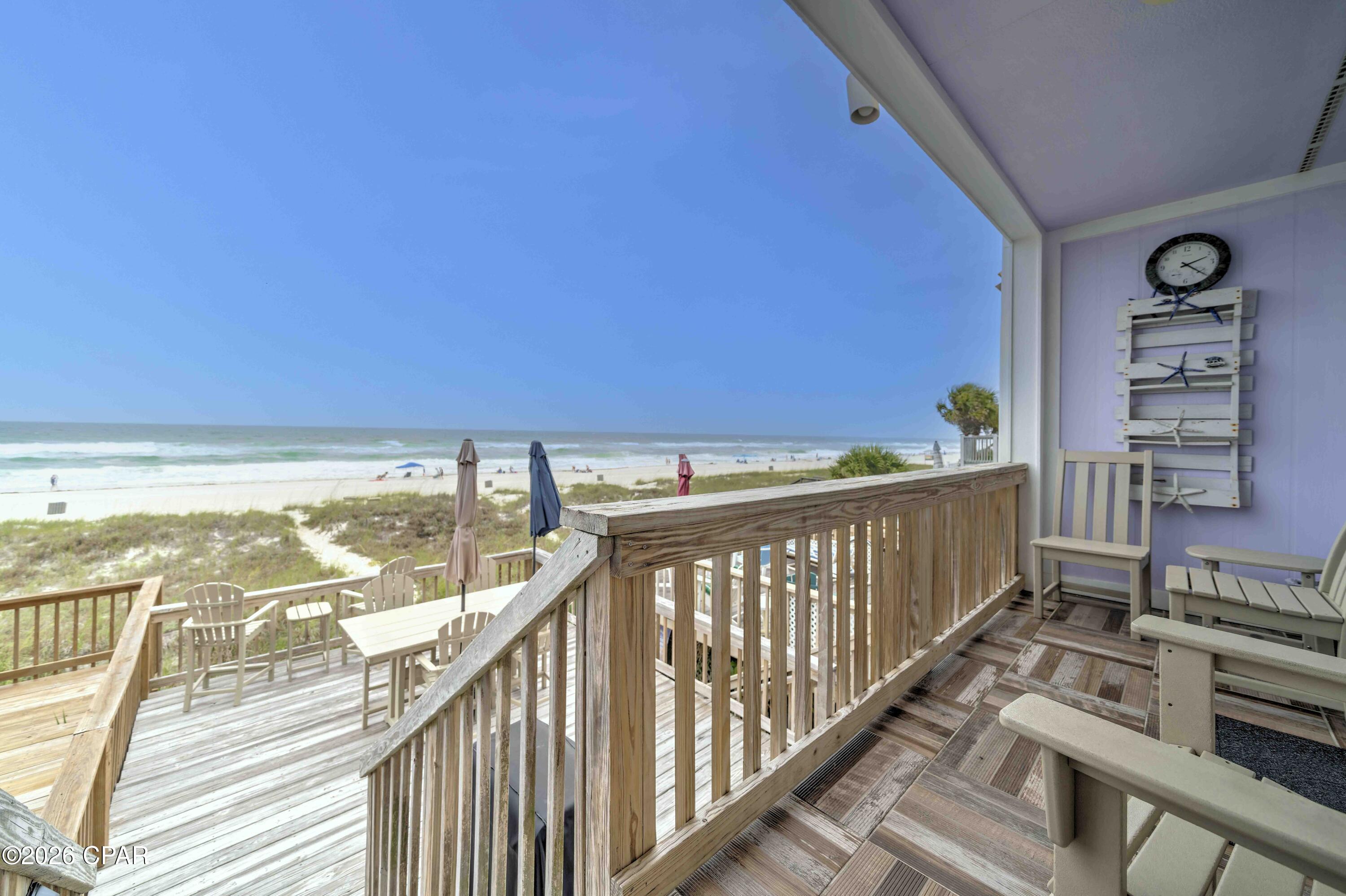 Experience GULF-FRONT LIVING at its finest in this fully furnished, short-term rental-ready townhome located directly on the sugar-white sands of Panama City Beach. With NO HOA, this property offers a rare combination of investment potential, flexibility, and beachfront enjoyment.

Thoughtfully updated and meticulously maintained, this coastal retreat features upgraded Anderson windows and Pella sliding glass doors, Hardie Board siding, a new roof (2025), updated HVAC, replaced plumbing, renovated bathrooms, and a stunning kitchen remodel completed in 2024 with new cabinetry, countertops, appliances, and lighting. The spacious interior is tastefully furnished and equipped with everything needed to continue operating as a successful vacation rental or to enjoy as a personal beachfront getaway.

Step outside to enjoy the Gulf views from the updated deck and outdoor living spaces, perfect for entertaining or relaxing after a day at the beach. Additional features include keyless entry, an owner's closet, electric vehicle charger, updated washer and dryer, upgraded insulation, and numerous other improvements that provide peace of mind for years to come.

Whether you're looking for a turnkey investment property, second home, or full-time beachfront residence, this Gulf-front gem offers the opportunity to own a piece of paradise with no HOA restrictions and direct access to one of Florida's most beautiful beaches!!!!!!! Call your Favorite Realtor to see this one!! Buyer to verify all measurements.
