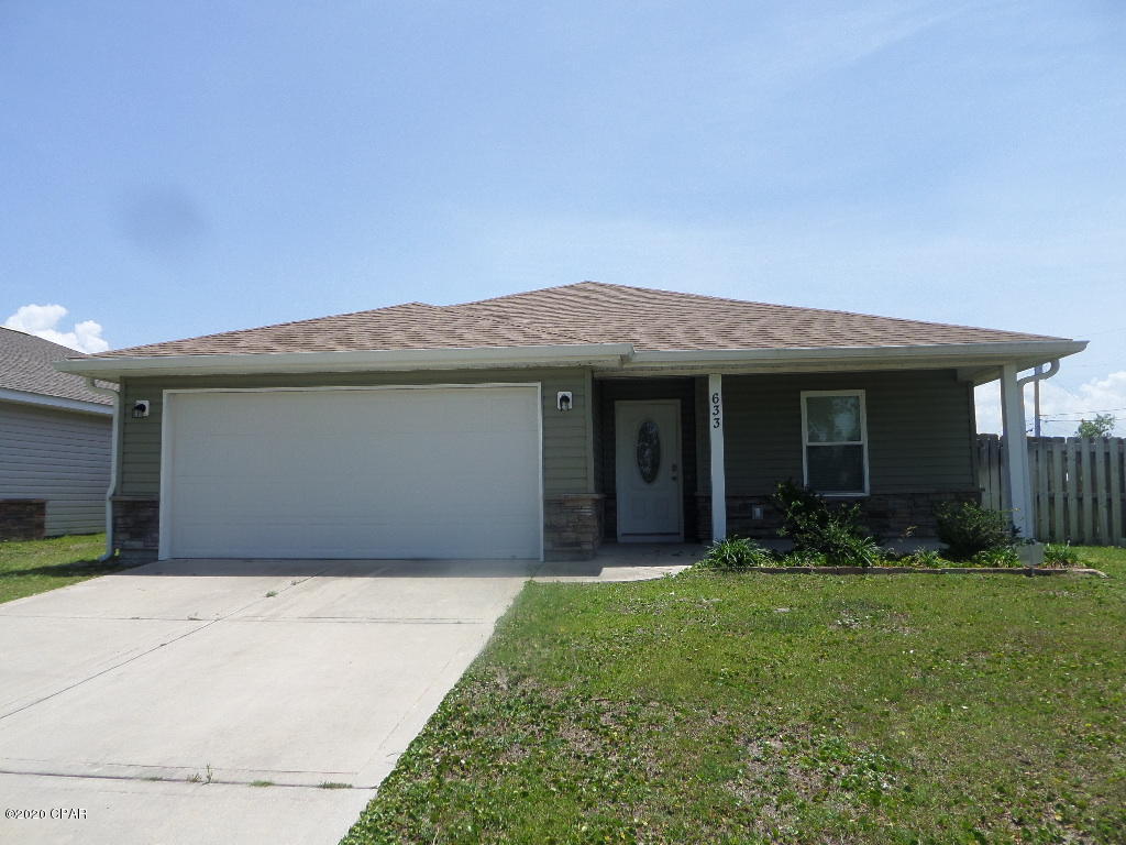 Wonderful 3 bedroom, 2 bath home with a 2 car garage. Open floor plan- The kitchen & island overlooks the dining and living room area. Features tile flooring and new carpet in the bedrooms.  Fresh paint on the interior.  Features tray ceilings in the great room and master bedroom. Large walk in closet and double vanity in the master. Fenced yard, and covered patio. Nice quiet neighborhood. Convenient to Tyndall AFB, shopping, schools.