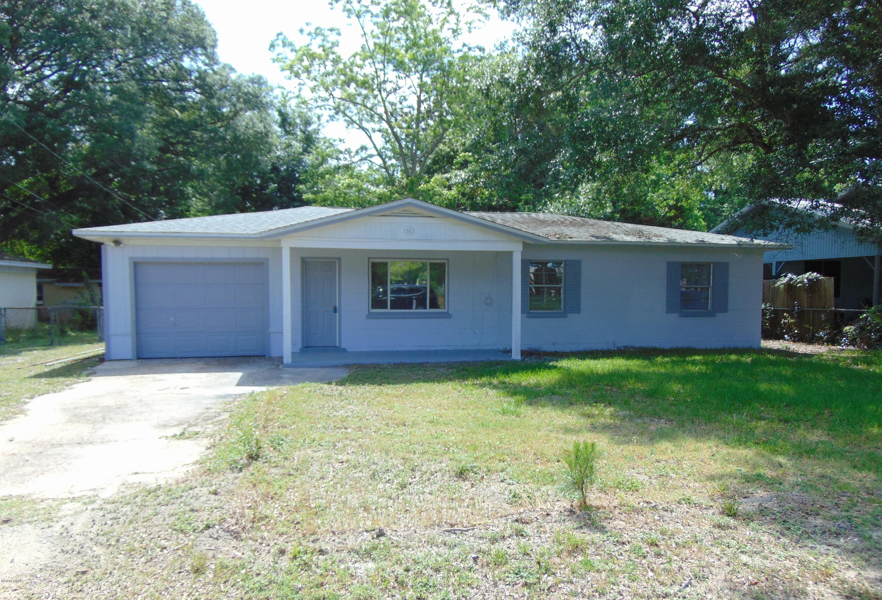 Newly Remodeled 2 bedroom 1 bah home with Bonus Room.  This home features newly painted interior and exterior, new blinds and wood flooring throughout, exterior storage room, interior storage room, laundry room and chain link fenced backyard.