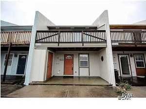 90 SECOND WALK TO OCEAN SURF !!! DON'T MISS THIS ONE !!! Seller says SELL at this just reduced GREAT PRICE !!Perfect FULLY FURNISHED Beach Home in every way. Excellent Condition and has been recently UPGRADED with many new things....ceramic tile though out, new bathrooms and kitchen, fenced back yard with great area for grilling; there is an outside shower for getting that sand off after returning from Beach; NO association fees; park right in FRONT of your door. Home is sold furnished except for TV's. Immediate Occupancy. GREAT RENTAL PROPERTY for Beach visitors; IT IS VERY RARE NOW FOR A BEACH HOME THIS NICE TO BE ON THE MARKET IN THIS PRICE RANGE!!!