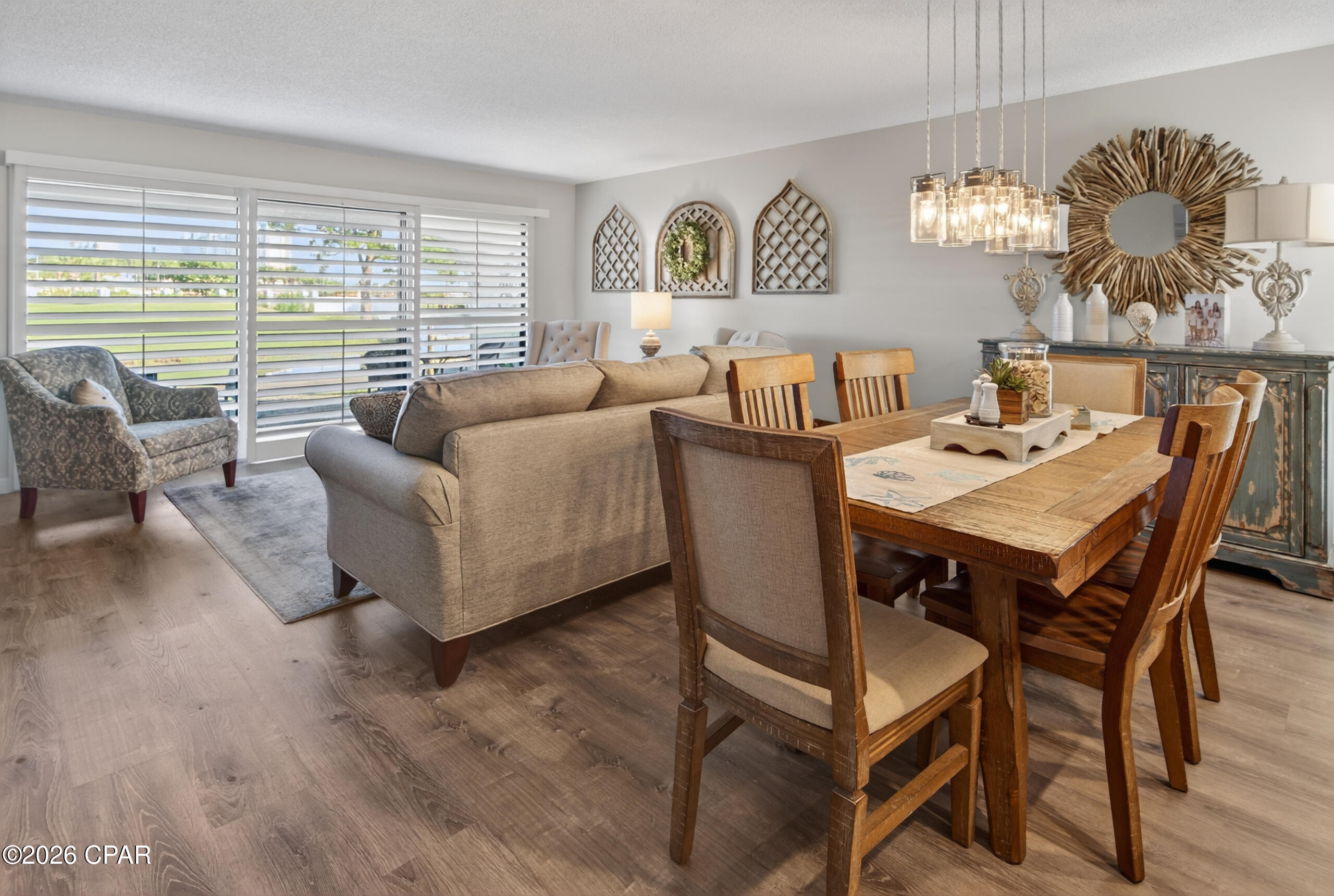 ASSUMABLE VA MORTGAGE at 4.75%. Welcome to Edgewater Golf Villa 1208, located in the premier Edgewater Beach & Golf Resort. This beautifully updated ground-floor 3-bedroom, 3-bathroom golf villa offers modern coastal elegance and a thoughtful layout designed for both comfortable everyday living and effortless entertaining. Step out onto your private patio and enjoy peaceful views overlooking on of the resort's many ponds with the lush golf course just beyond. Edgewater Beach & Golf Resort is the the only full-service resort in Panama City Beach, delivering an unmatched lifestyle with exceptional amenities, including a beachside lagoon-style pool with poolside tiki bar, 10 additional heated pools, 4 hot tubs, kids splash zone, par 3 golf course, fitness center, tennis, pickleball, basketball and shuffleboard courts, a seasonal resort wide tram service and so much more. Enjoy gulf views while dining at the onsite Ocean's Bar & Grill or grab a quick snack or Starbucks at Edgie's Corner Market. Whether you're seeking a primary residence, a second home, or a turnkey investment property with strong rental income potential, this move-in-ready villa is perfectly positioned to meet your needs. Come experience the best of resort living at Edgewater Golf & Beach Resort.