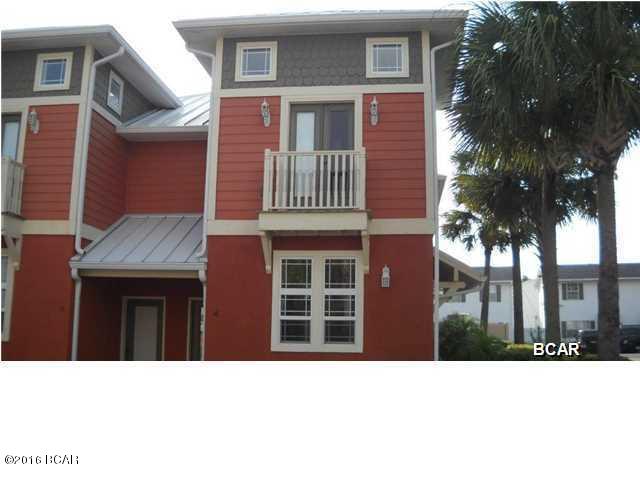 Mediterranean style town home located on the West end of Panama City Beach. Just minutes from Pier Park and a short drive to Walton County. The community features a community pool and trash. The unit features an open living room, dining room, kitchen combo with the master bedroom downstairs, and a half bath off of the living room. The two spare bedrooms are upstairs with a jack and jill bathroom.