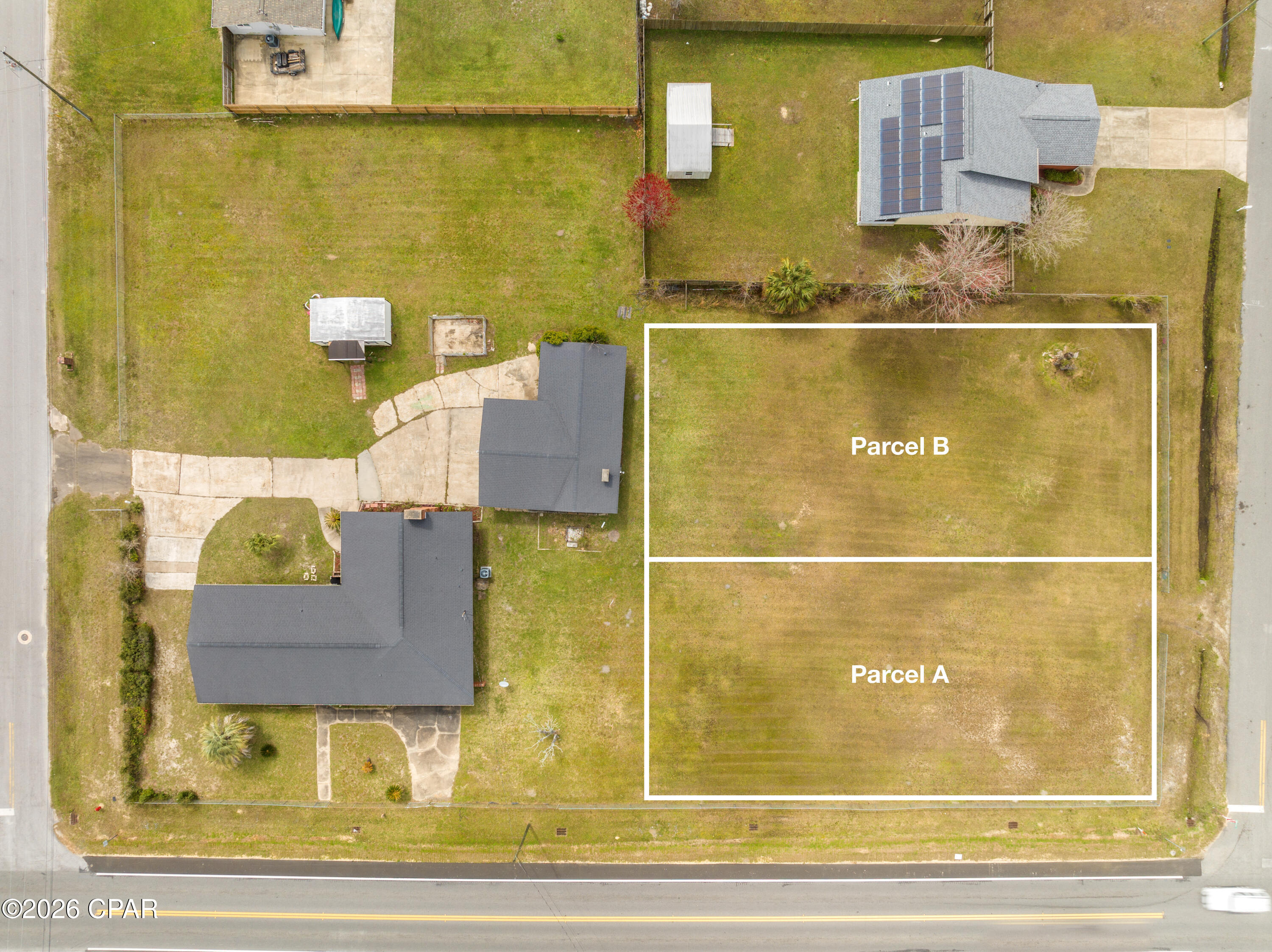 0.26-acre corner lot (Parcel A in Photos) in Lynn Haven. Cleared and build-ready with paved frontage. Utilities nearby. Flood Zone X. No HOA. Near public bay access. 

This 0.26-acre residential corner lot in Lynn Haven offers a cleared, build-ready site with defined boundaries. Positioned at the corner of Arkansas Avenue and 12th Street, this homesite provides flexibility for home design and orientation while maintaining primary access from Arkansas Avenue. Located in Flood Zone X, the property reduces common insurance concerns and supports a more straightforward path to construction.

The lot has been cleared and requires no site preparation. No soil or perc testing has been completed. Buyers should verify any requirements based on their intended build. Utilities, including electric, public water, and sewer, are available nearby. Buyers should confirm connection points, distances, and applicable impact or tap fees with the City of Lynn Haven. The cleared condition and layout make this a practical option for new construction without additional site work.

Zoned for residential single-family use, this parcel supports a range of build options for both end users and builders. Based on available information, typical Lynn Haven setbacks may apply, such as approximately 25 feet front, 10 feet sides, and 20 feet rear, though all requirements should be independently verified before planning.

The property is located within Lynn Haven city limits with convenient access to Highway 77, shopping, dining, and daily services. Public access to the North Bay and nearby shoreline areas, including Leslie Porter Wayside Park, is approximately a 4-minute drive, which adds to the appeal for buyers seeking proximity to outdoor recreation and water access.

The property is offered as-is. This parcel is one of two similarly sized lots created from a larger parcel, each listed separately.