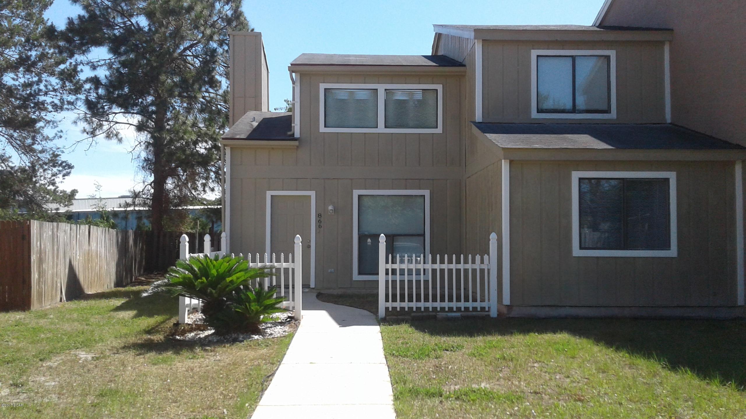 Spacious 3 bedroom 2.5 bath Townhome. (End unit) Approximately 1430SF heated & cooled.  New appliances- Range, Dishwasher, Side-by-Side Refrigerator.  New Kitchen counter-top and lower cabinets. Plenty of cabinet space, and pantry. New bathroom vanities and fixtures. New carpet, fresh paint inside & outside. The home also features wood burning fireplace.  Tile flooring in the kitchen, bathrooms, and hallway.The Master suite is located downstairs, and has it's own with private bath.  The 2 other bedrooms are upstairs. The property is centrally located in the heart of Panama City. 3 blocks from the Bay, 1 block away from walking park. Convenient to shopping, the beaches, downtown marina, and schools.Only 15 minutes to the Naval Station, and 20 Minutes to Tyndall AFB. NO PETS ALLOWED. The property is centrally located in the heart of Panama City. 3 blocks from the Bay, 1 block away from walking park. Convenient to shopping, the beaches, downtown marina, and schools. Only 15 minutes to the Naval Station, and 20 Minutes to Tyndall Air Force Base.  More photos coming soon! Schedule a viewing appointment today!