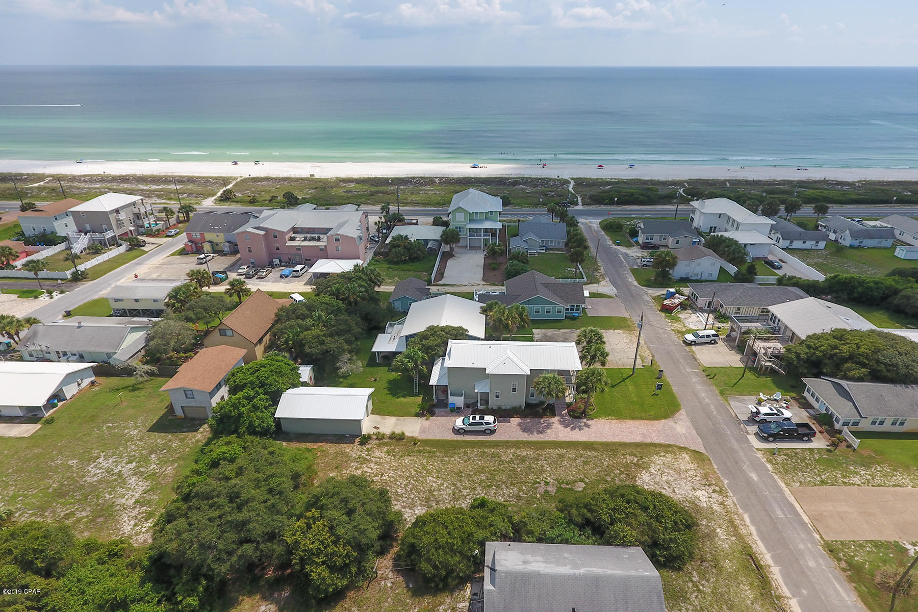 ACTIVE-CONTINGENT ACCEPTING BACKUP OFFERS! This spacious lot is located within one block to the white sands and emerald green waters that beckon people from all over the world. This lot offers you the opportunity to design and construct your own little beach haven. You are in charge of the design, style and colors of your dreams, then share your time between your very own beach home and some 2,800 feet of private, dedicated beach access for you and your guest. This lot is located on a dead end street for minimal car, bicycle and foot traffic. The POA voted to close all paths to the beach with the exception of 5 which will be gated.