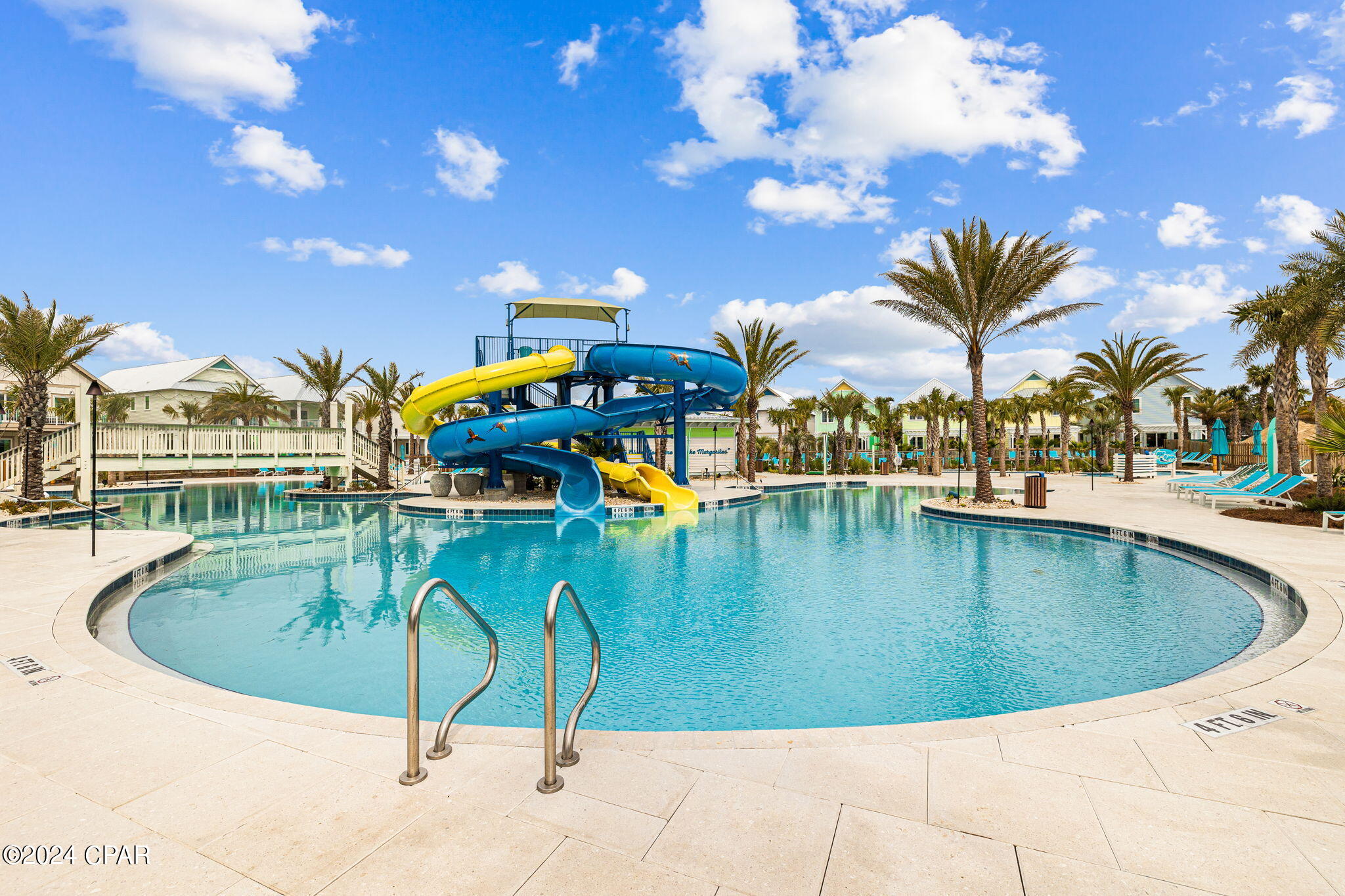 Are you ready to enjoy paradise? This brand new home is located in the hottest development in all of North Florida - Margaritaville Beach Cottage Resort! The home features 5 bedrooms and 4.5 baths on two floors of living space. This beautiful coastal Caribbean home is centrally located within the resort with lush landscaping and just steps from the resort amenities. The moment you walk through the front door you will feel like you are in paradise. The well-appointed home has a upscale, soft, coastal vibe accented by pops of fun color and art that let you know you are in Margaritaville. The open concept first floor has a chef's kitchen with huge island, quartz countertops, soft close maple cabinets, and stainless Frigidaire appliances including a six-burner gas cooktop. The first floor also features one of two primary bedrooms with a king size bed and ensuite bath. Upstairs you'll find the second primary bedroom with a king size bed and ensuite bath, a queen bedroom with an ensuite bath and two additional queen bedrooms with a large, shared bath. The first floor patio features a dining table and the second level balcony features generous seating and partial gulf views. There is room for three vehicles to park on the paver driveway. This floorplan is perfect for families to enjoy. Margaritaville Beach Cottage Resort offers owners and their guests a true resort with fantastic amenities and services. It will be hard to decide what to do first - float along the 425 foot long lazy river, try out the water slides, relax in the huge oasis pool, or enjoy a cheeseburger and margarita at the poolside bar and grill. And let's not forget you can also enjoy 580 feet of dedicated beachfront offering a full suite of beach services, sparkling emerald green waters and soft sandy beaches! In 2025 you will also be able to enjoy the full service restaurant, fitness center, arcade and more! Margaritaville Beach Cottage Resort is a short-term rental community with every amenity a guest would love to enjoy while on vacation. HOA total in the listing includes the HOA which is $1775.00/qtr for HOA and $450/qtr for Club dues. A one-time capital contribution of $1,220 is due at closing and a Club Membership deposit of $5000 is required, but the buyer will get back 80% down the road when they sell and close.