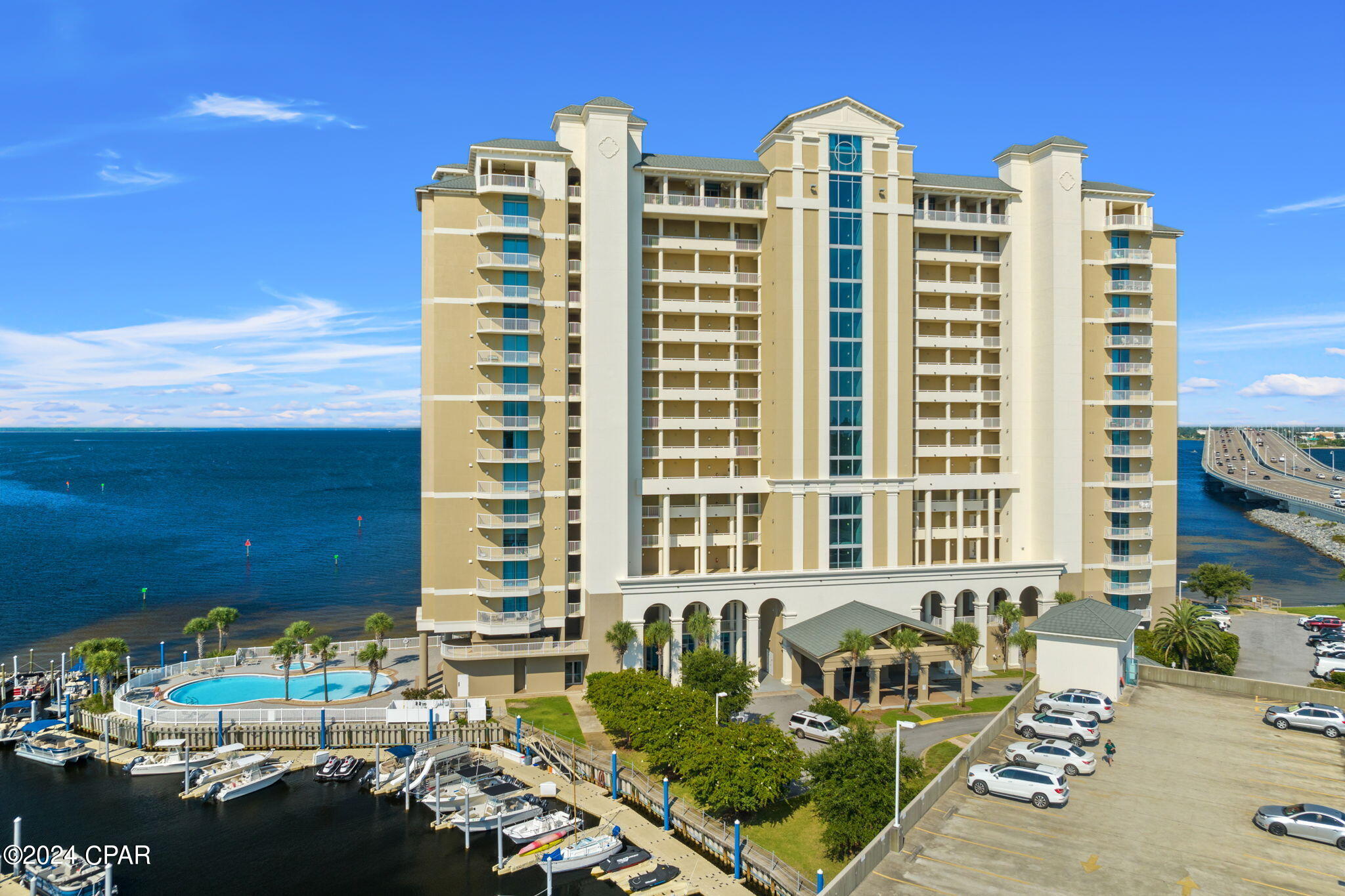 Discover unparalleled waterfront living in this spacious 3-bedroom, 3-bathroom condo, boasting nearly 2,000 square feet of luxurious space with breathtaking panoramic views of St. Andrew's Bay. The gourmet kitchen is a chef's dream, featuring beautiful granite countertops, a faux painted island with intricate corbels, and freshly painted cabinets. The master suite is a serene retreat with expansive bay views, an ensuite bathroom equipped with double vanities, a spacious walk-in shower, and a jacuzzi bathtub.

Each room is adorned with designer lighting, adding to the condo's elegant ambiance. Step outside to the oversized, covered balcony, perfect for entertaining, with views of the Hathaway Bridge, PC Port, and St. Andrew's Bay, complete with a built-in grill.

Marina Landing offers an array of amenities, including covered parking, a private marina with deep water access to Shell Island and the Gulf of Mexico, a bayfront swimming pool, a fitness center, and a fenced dog park. Centrally located in the heart of Panama City, this exclusive residence prohibits short-term rentals, ensuring a tranquil living environment. Don't miss the opportunity to own this exceptional waterfront condo!