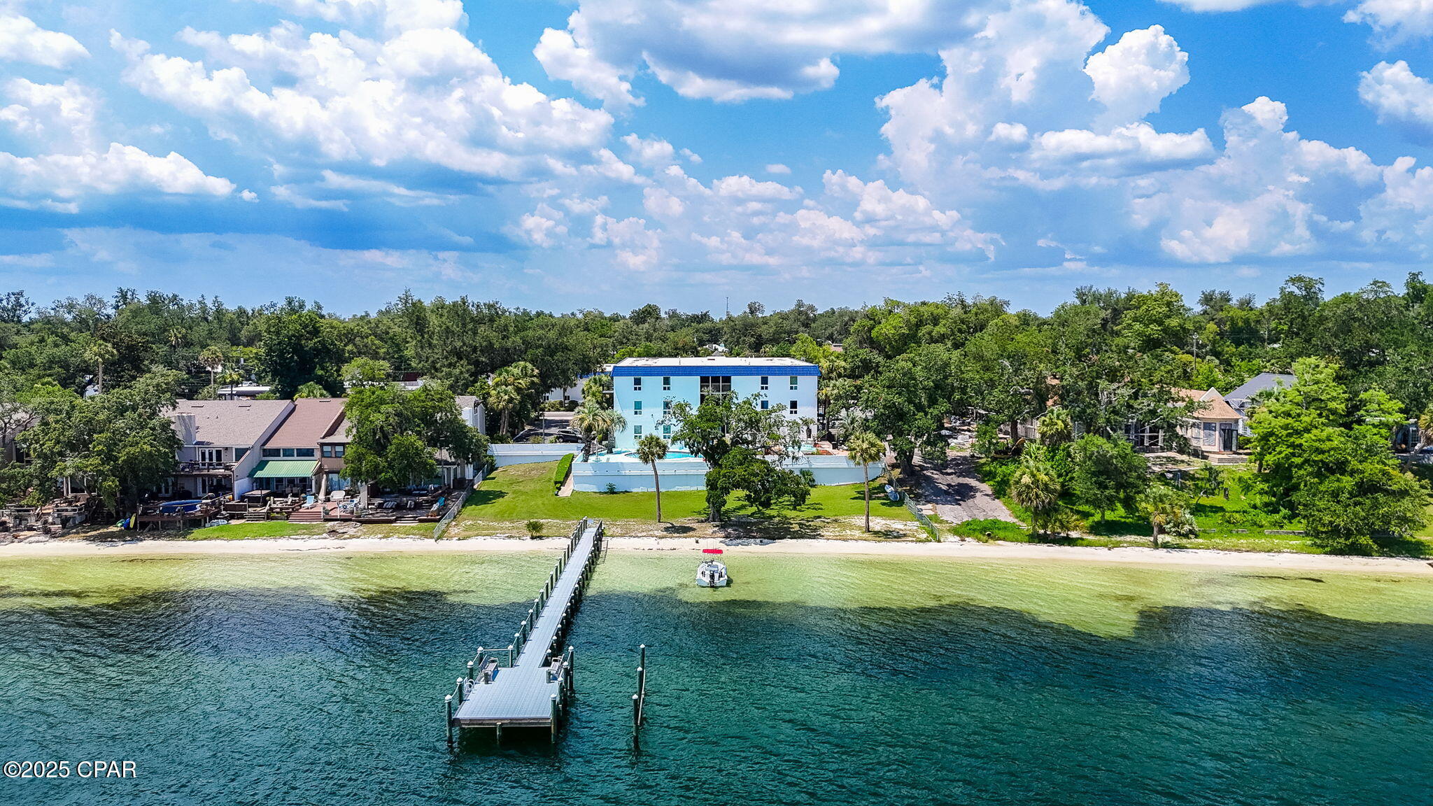 RECENTLY REMODELED with a modern industrial design, this stylish condo is in a prime location in the heart of Panama City - The Cove.  Located directly across the street from St. Andrews Bay, this first floor unit features updated finishes throughout, including exposed ductwork, concrete -style accents, stainless steel appliances, quartz countertops and custom cabinetry.  There is also a small fenced in yard and doggy door, which is also removable, for your furry friends. 

The open-concept floor plan is ideal for comfortable living and entertaining.  Residents enjoy access to a large waterfront community pool and private dock, perfect for waterfront activities like paddleboarding, kayaking or just soaking in the sun. And 
with downtown Panama City less than a mile away, you can enjoy shopping, great restaurants and live music in minutes.  

This condo will come partially furnished and move in ready.  The A/C was replaced last year and there is an all in one, ventless washer/dryer combo that will stay.

Whether you're looking for a full-time residence, vacation home, or income producing property, this condo delivers on every level.  Don't miss your change to live by the water in the Cove.