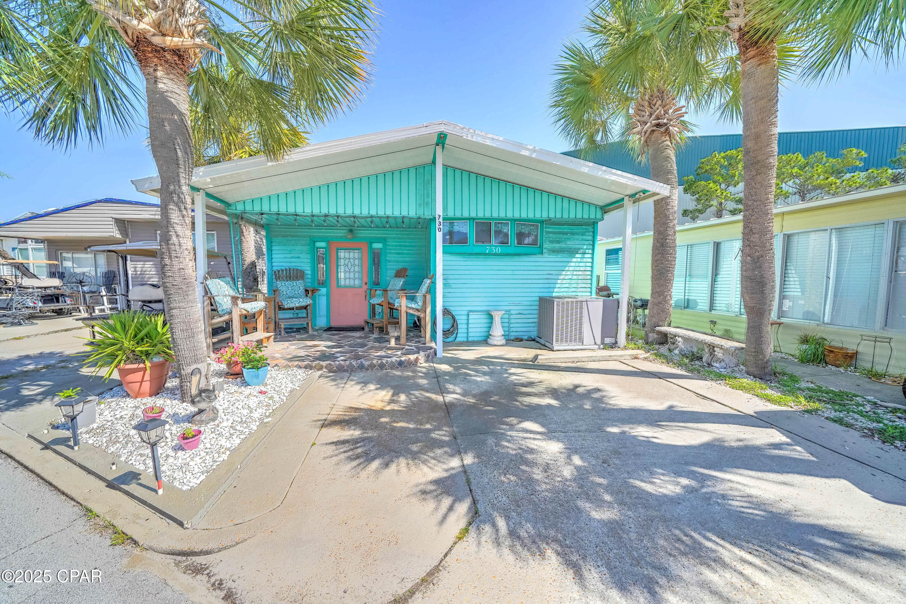 Here's your chance to own in Venture Out! Check out this adorable 2-bedroom charmer. Good size living room and bedrooms. Room in the hall for potential bunk room. Located on a quiet street within the resort. Perfect opportunity for investment or second home.  Venture Out is a golf cart community that has exploded with popularity recently... With 300' on the beautiful pristine beaches of the Gulf of Mexico and 1,000' on the Grand Lagoon. Venture Out has something for everyone.