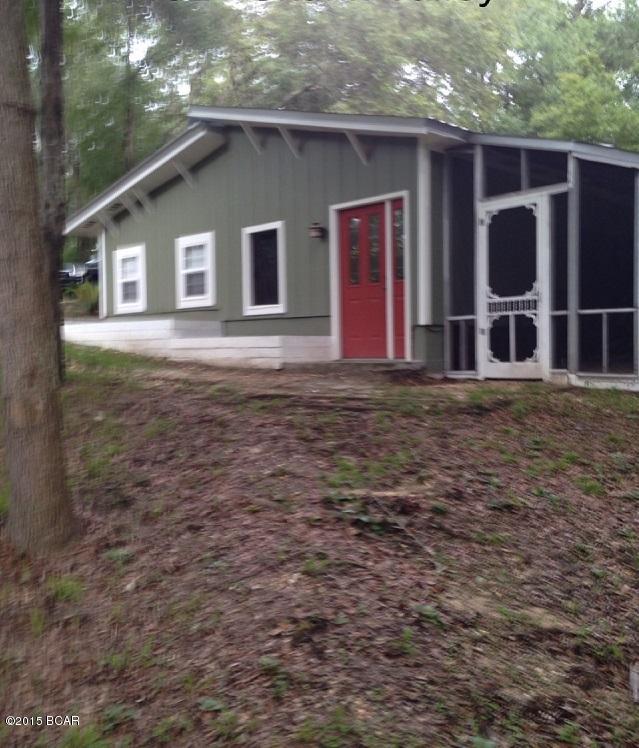 Beautiful, rustic and secluded home in Chipley! Florida room, shed, tiled shower, and a lot of space! This is a must see, it has so much charm! All measurements are approximate.