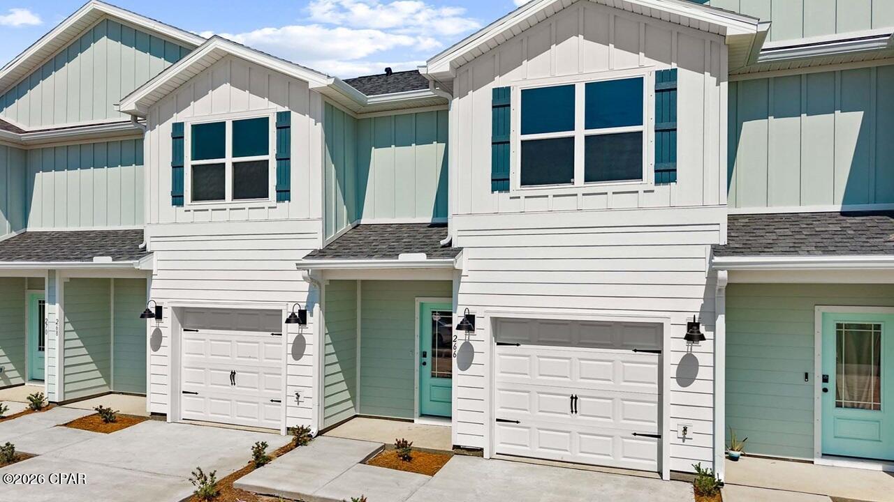 Welcome to 256 Phillips Bluff Avenue, a new home at Colonial East Townhomes in Panama City Beach. This townhome is an interior unit of a six-unit building that is ready for move in. This floor plan has 3 bedrooms, 2.5 bathrooms with a bright foyer leading to the expansive open-concept kitchen, living, and dining area, designed for entertaining and everyday living. The kitchen is open and spacious with a center island and overlooks the main living area. Interior features include quartz countertops, EVP throughout the main level, EVP treads on the stairs and carpet in bedrooms and upstairs hallway. 


The first floor is heart of this home, while the privacy of the second level holds all bedrooms, ensuring a quiet retreat. The primary bedroom has a generous size closet and a private bathroom with dual sink vanity, and ample linen storage, and a large shower. Additional bedrooms share a hall bath, creating a comfortable space.



A Smart Home Technology Package comes standard, featuring a Qolsys IQ touch panel for thermostat and lighting control, ensuring security and convenience with keyless entry KwikSet deadbolt. Exterior features of Colonial East townhomes are equally impressive, with Hardie® siding. A landscaped front entry adds curb appeal and welcomes you to your very own slice of Florida paradise. Call us today for more information on Colonial East.