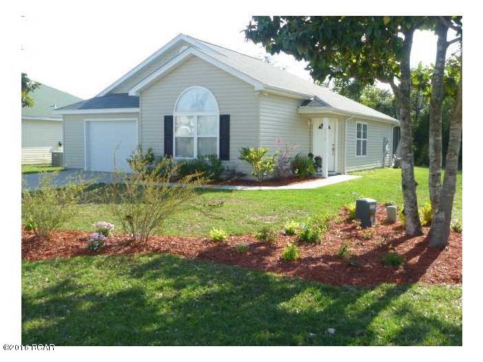 3 bedroom 2 bath  home with hardwood floors in the living room and hallway; ceramic tile in the kitchen, baths and foyer; split floorplan; cathedral ceilings in the great room and master bedroom; lots of richly colored, cherry-stained cabinets in the eat-in kitchen (with pantry) that leads to a lovely screened porch that overlooks the private backyard (with no-build wetlands behind home.)  All property sizes and ages are approximate, please measure and/or verify if important. 

School assignments are subject to change, please check with Bay County for most accurate information.

Deposit is the same as the rent.

Pets allowed with owner approval and NON REFUNDABLE pet fee applies per pet.  Breed restrictions apply.