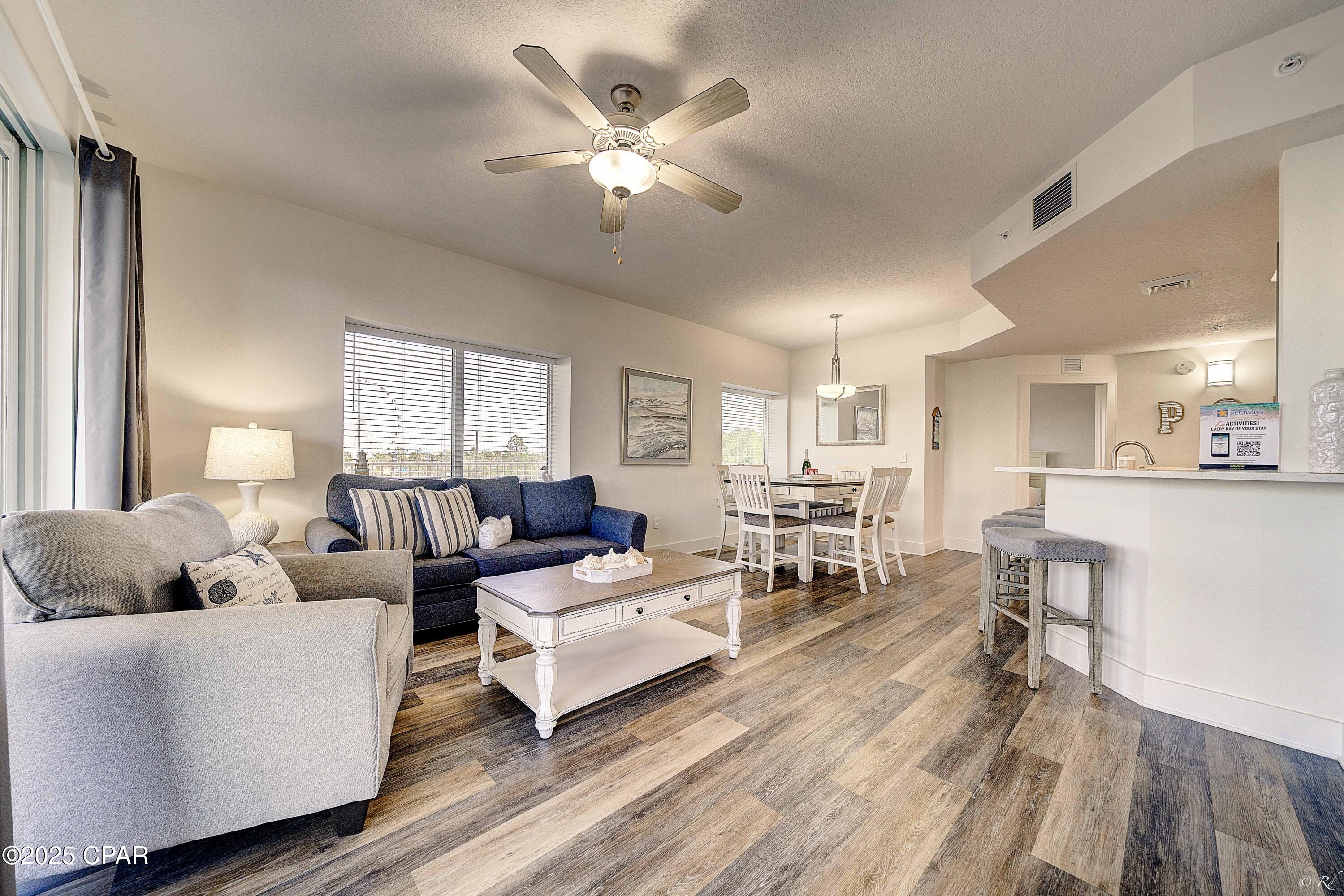 UPDATED PICTURES COMING SOON TO REFLECT CUSTOM UPDATES THROUGHOUT.
Experience costal living at its finest in this beautifully fully furnished 3-bedroom, 3-bath condo at Calypso Tower III in Panama City Beach. This desirable corner unit features a spacious wrap-around balcony - perfect for enjoying sunsets and gulf breezes.
The open-concept layout offers modern finishes and a light, airy feel. The primary suite includes a king bed, walk-in closet, oversized tiled shower, and direct balcony access. The second bedroom features a queen bed, step-in closet with built-in shelving, and a private full bath with tiled shower. The third bedroom is ideal for guests or kids, with a double bunk bed, under-stair storage, and its own full bath with a tub/shower combo. The kitchen is equipped with stainless steel GE appliances, sleek countertops, and ample cabinetry. The living and dining area is designed for both relaxation and entertainment.
Calypso Tower III offers resort-style amenities second to none. Located within walking distance of Pier Park, dining, shopping, and entertainment.
This unit is turn-key ready—ideal for a second home or a high-performing short-term rental.