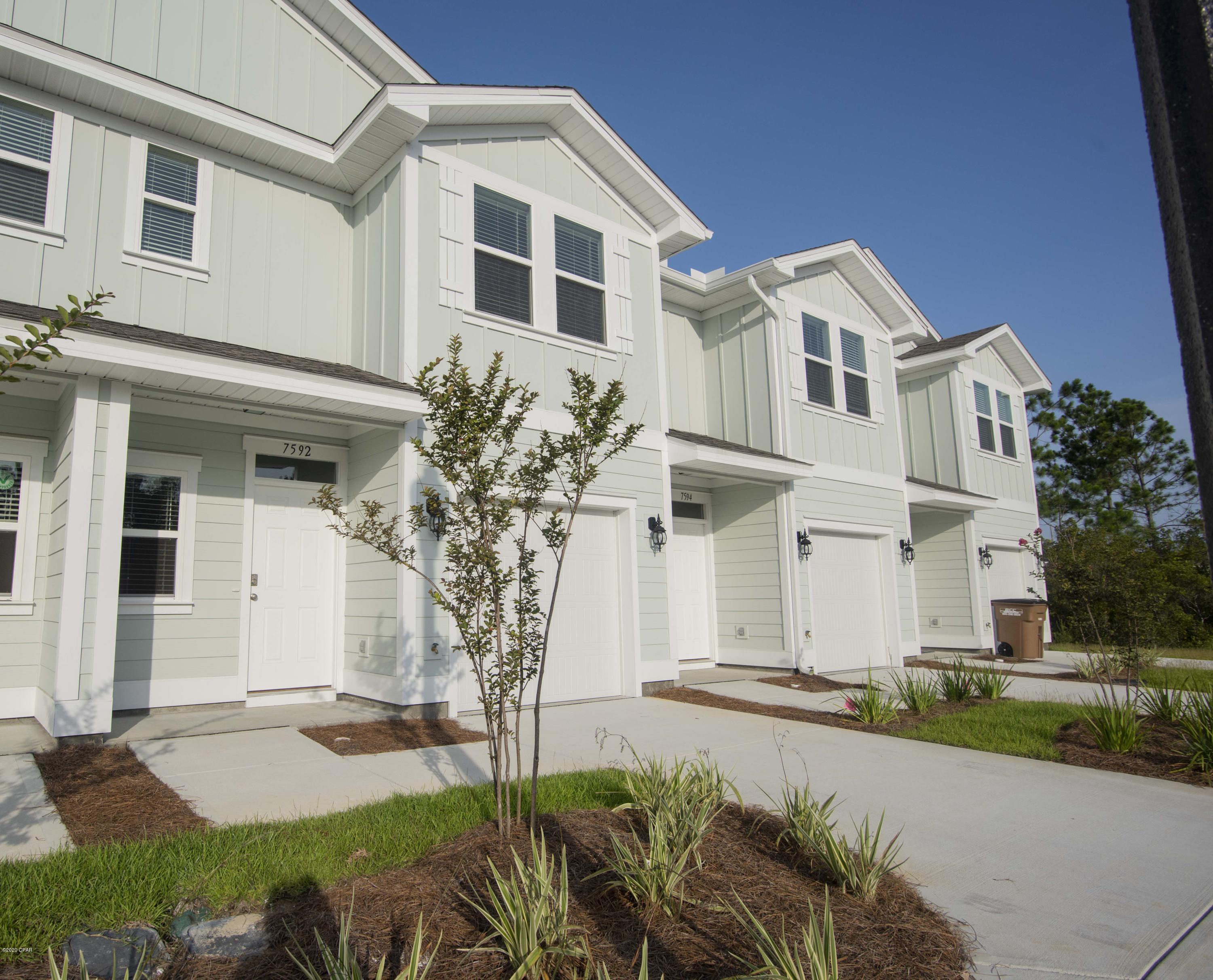 3 bedroom, 2 1/2 bath townhome in Hathaway Townhomes. This unit is brand new and never lived in.  Downstairs the home features a nice size kitchen with stainless steel appliances, granite counter tops, pantry, & breakfast bar.  Living area downstairs is spacious & there's room for plenty of furniture & a dining room table. You'll appreciate the half bath for your guests. Upstairs you'll find three nice size bedrooms, new washer and dryer, extra storage closets and a full bathroom. The master is enormous & boats a relaxing en suite bathroom with a shower & double sink vanity.  You'll love the walk in closet! Outside features a wood deck that backs up to a quiet preserve. This townhome is also steps away from the community pool featuring waterfalls, handicap access, & bathrooms.